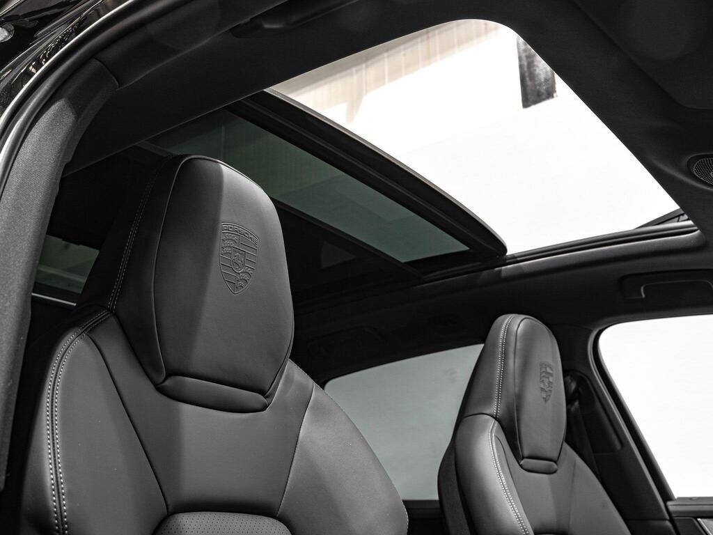 An interior shot of the driver seat on a 2023 Porsche CAYENNE