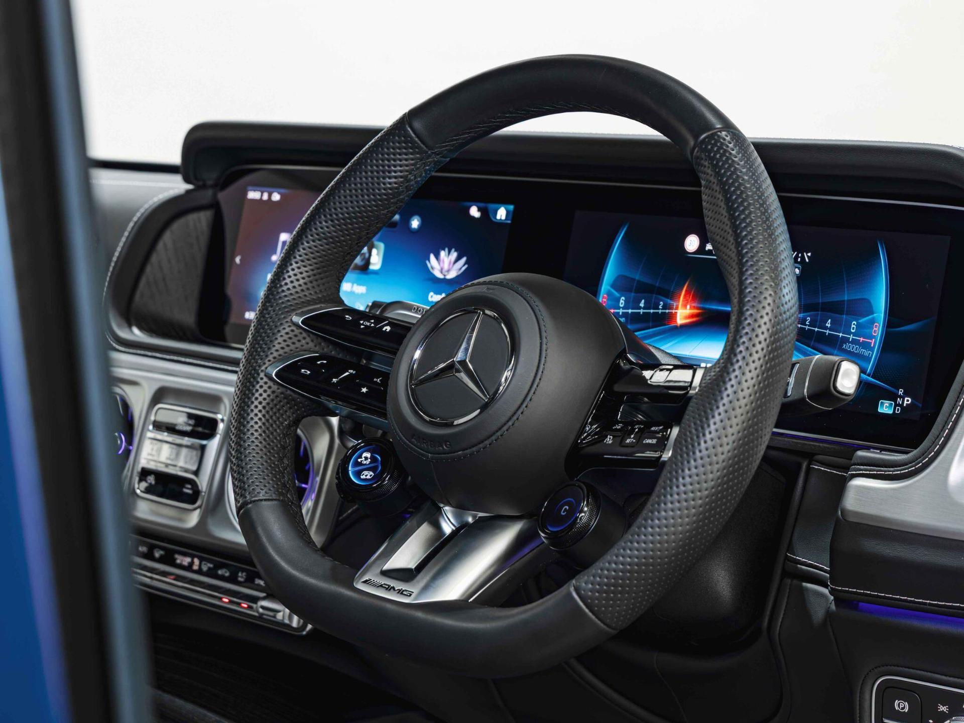 An interior shot of the steering wheel on a 2025 Mercedes-Benz G-Class