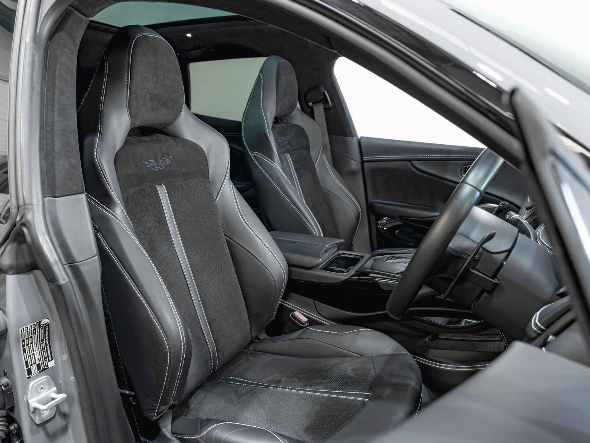 An interior shot of the driver seat on a 2022 Aston Martin DBX