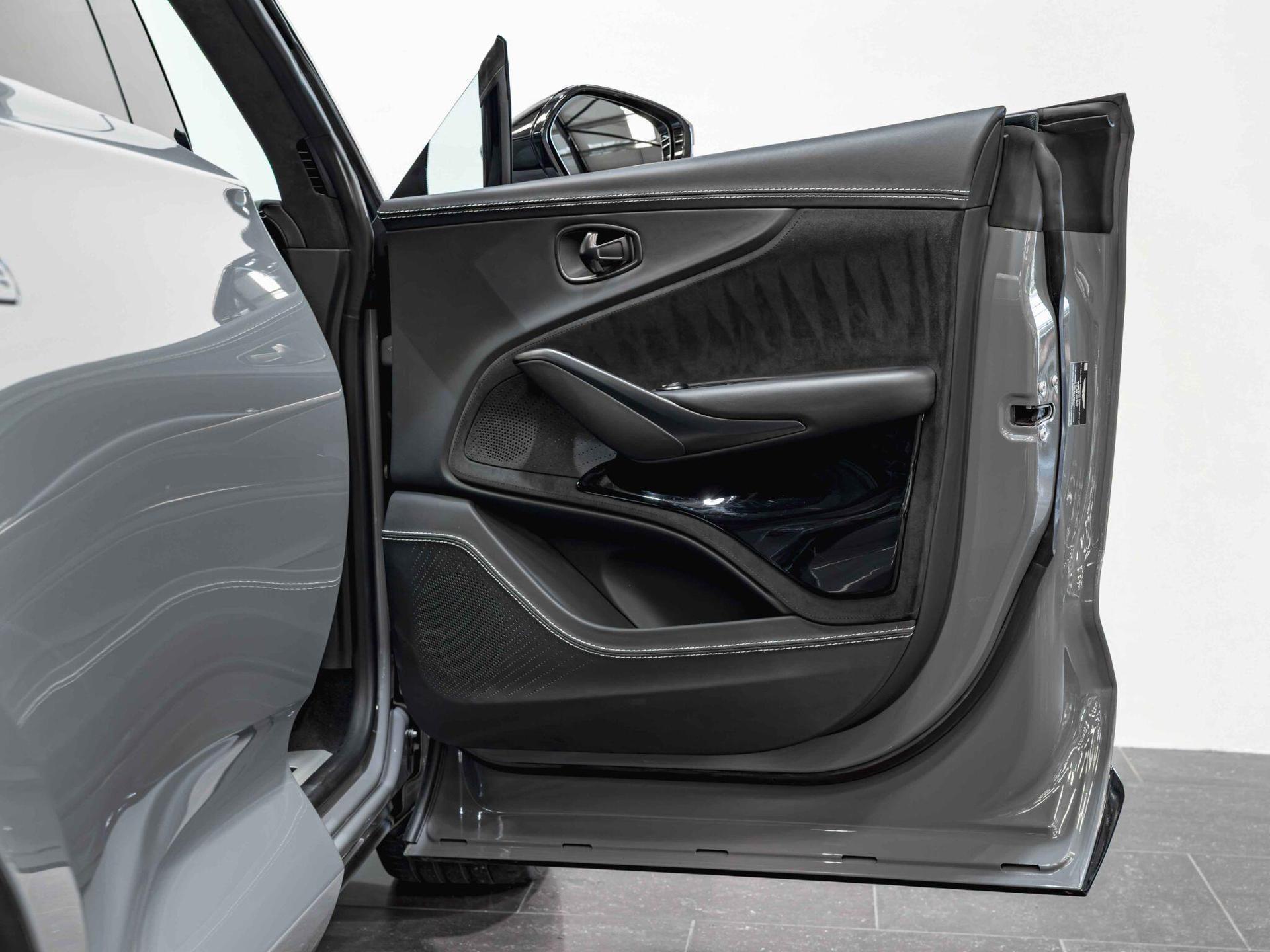 An interior shot of the door interior on a 2022 Aston Martin DBX