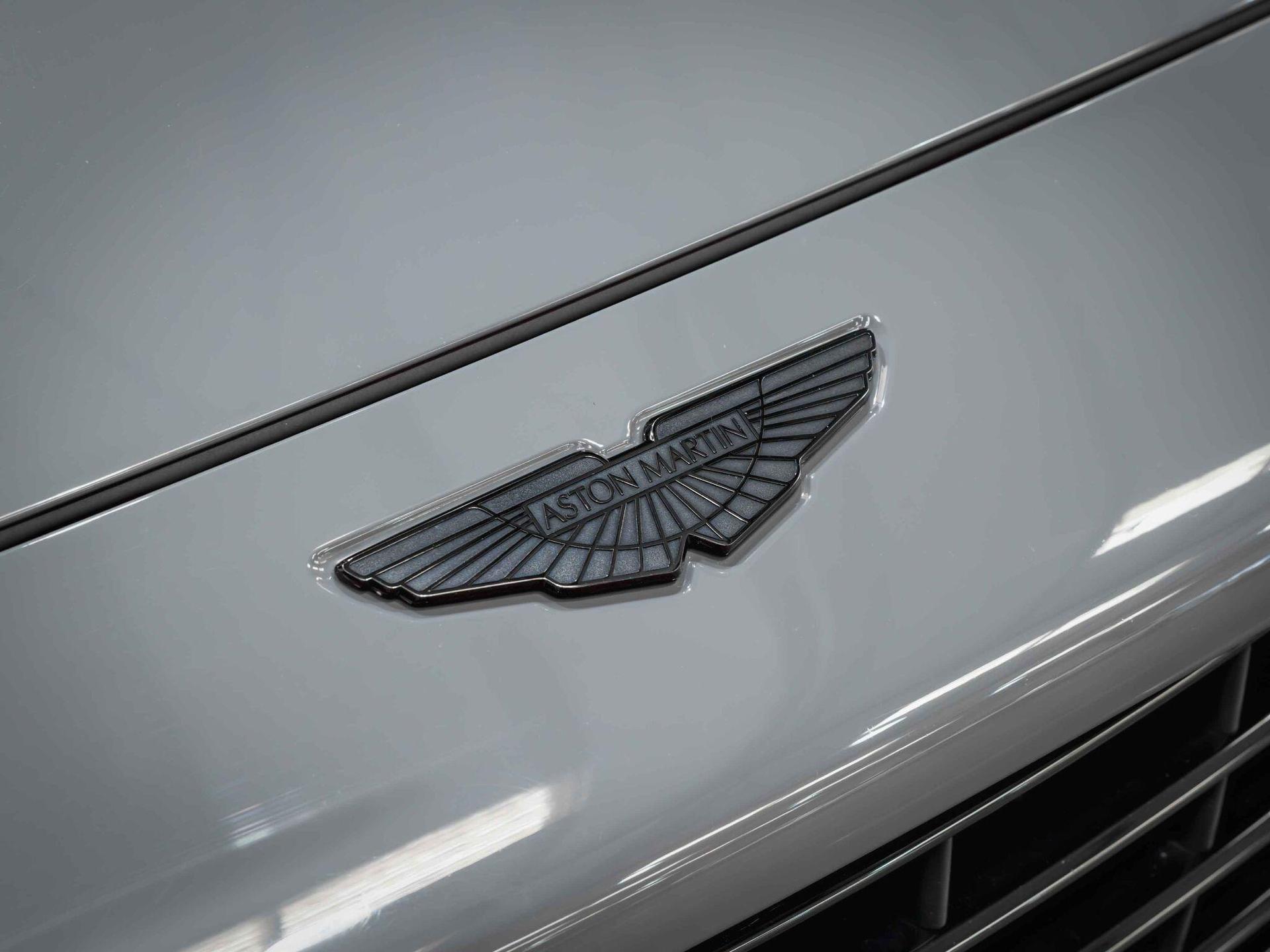An exterior shot of the badge exterior on a 2022 Aston Martin DBX