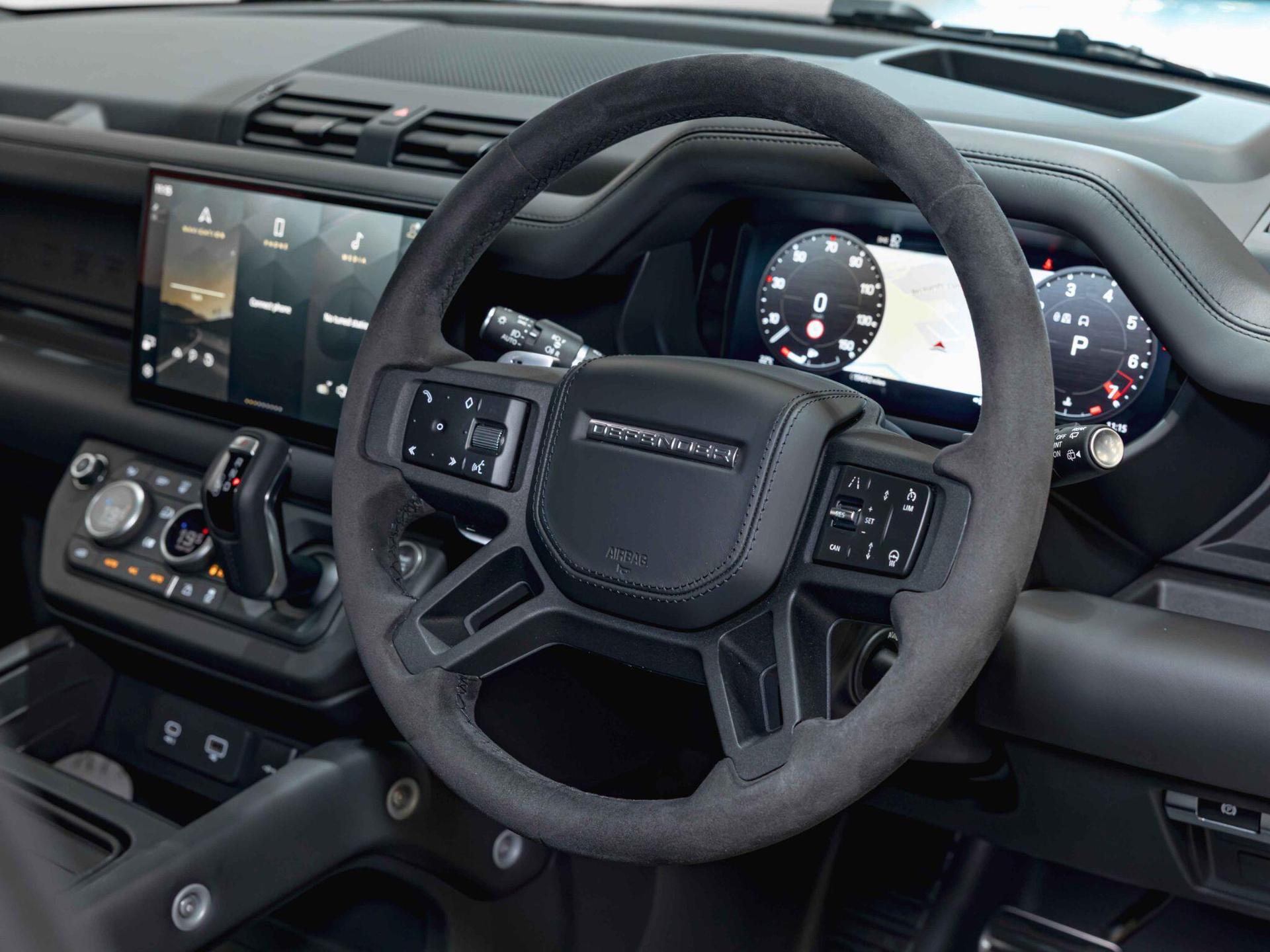 An interior shot of the steering wheel on a 2022 Land Rover DEFENDER