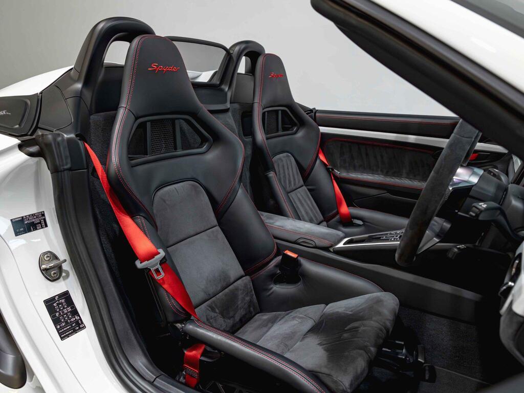 An interior shot of the driver seat on a 2015 Porsche Boxster