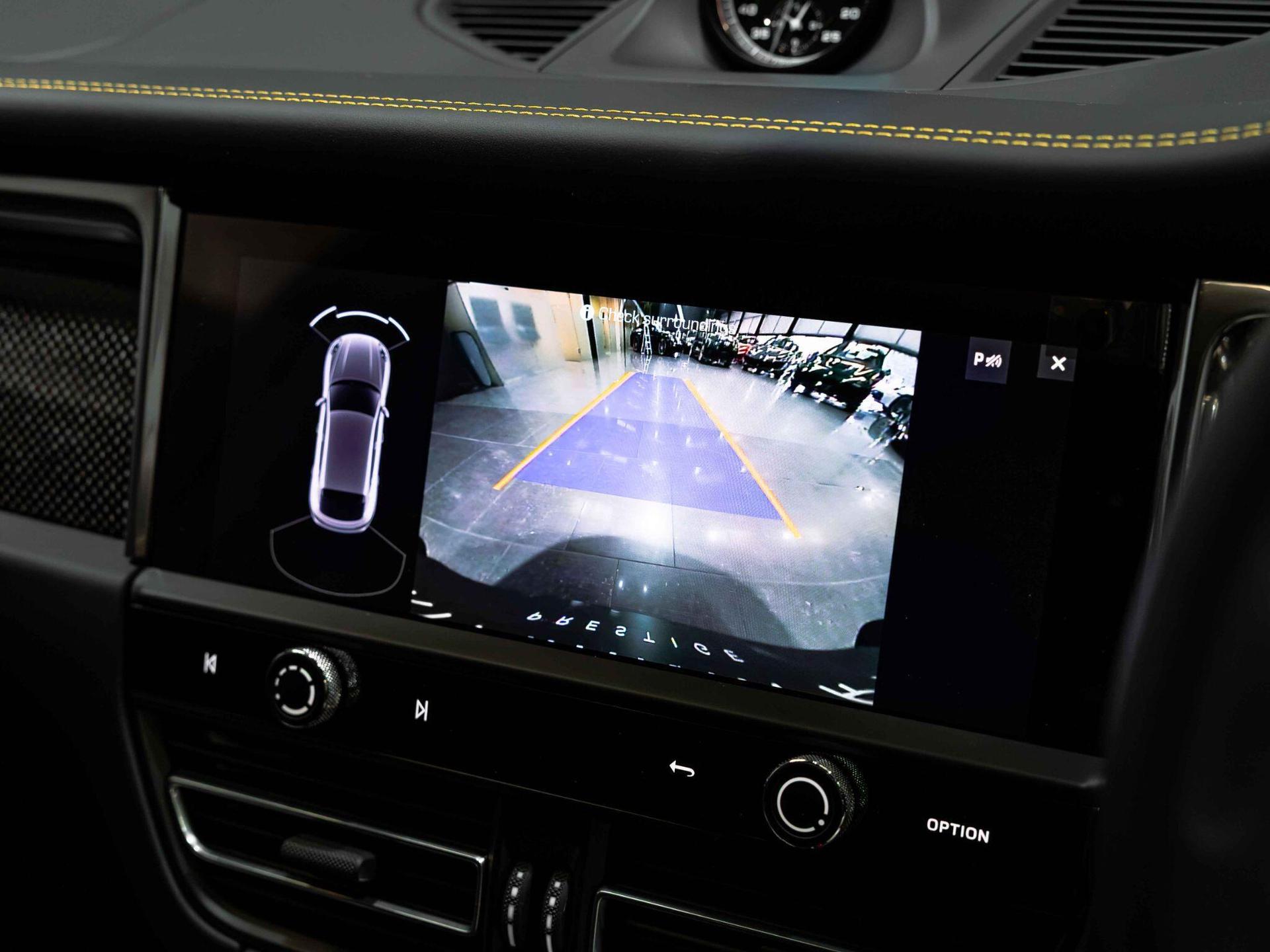 An interior shot of the infotainment system on a 2025 Porsche Macan