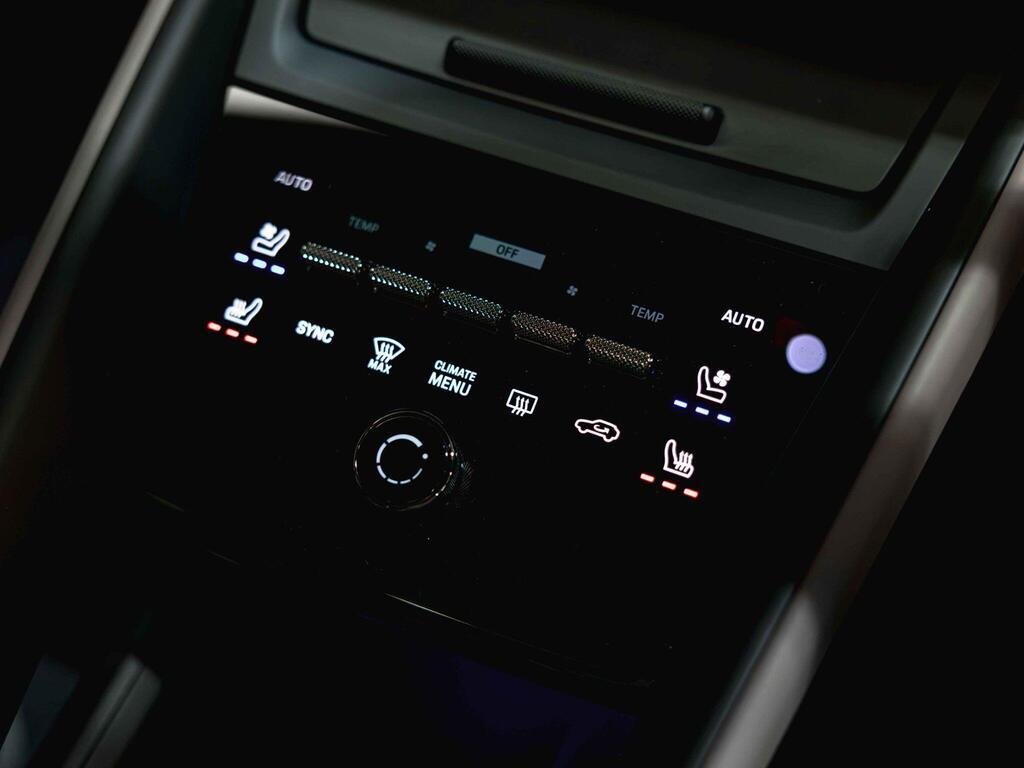An interior shot of the misc controls on a 2024 Porsche Macan