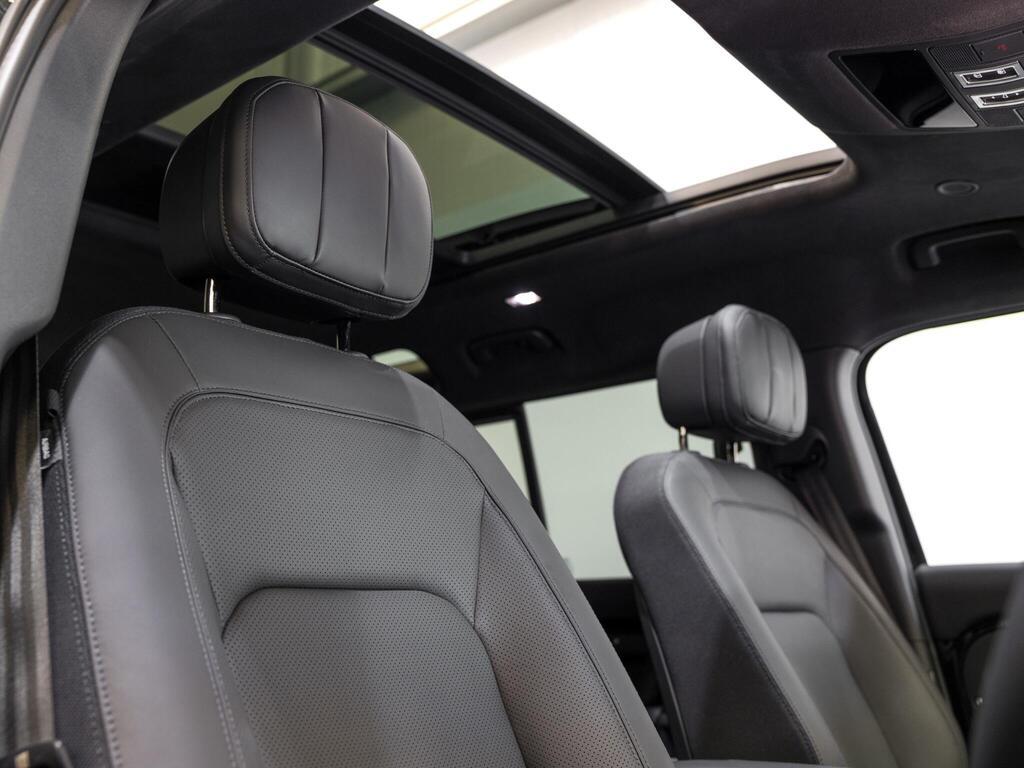 An interior shot of the driver seat on a 2025 Land Rover Defender 110