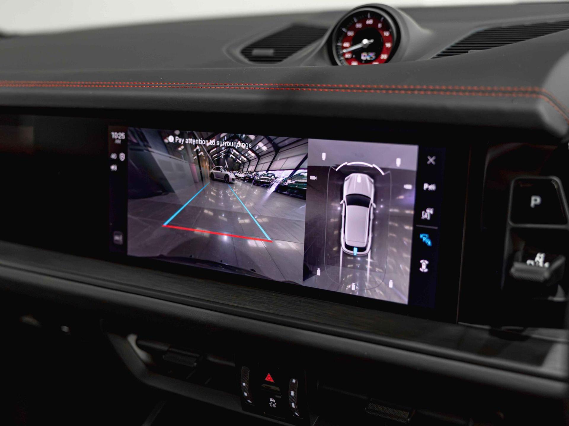 An interior shot of the infotainment system on a 2024 Porsche Cayenne