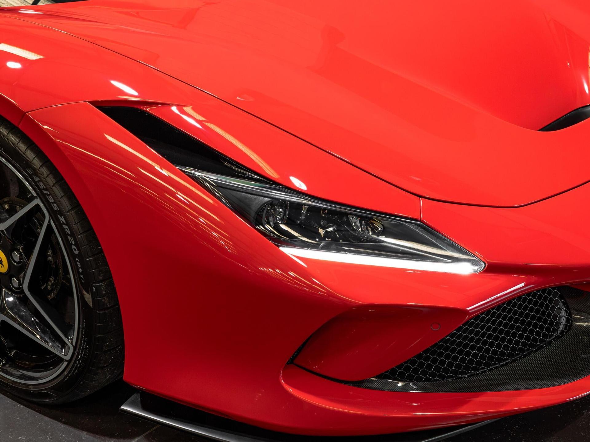 An exterior shot of the lights front on a 2021 Ferrari F8 Spider