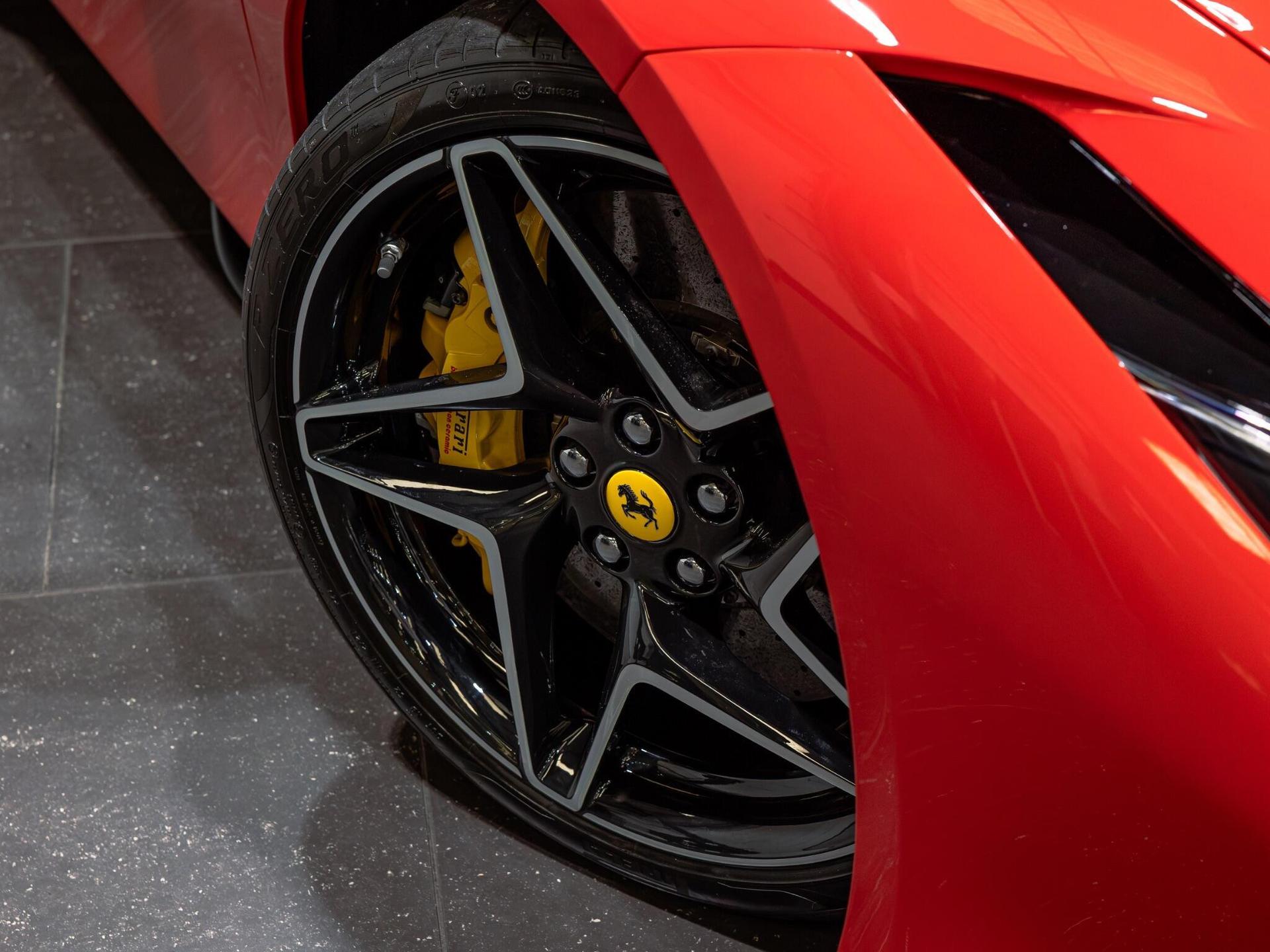 An exterior shot of the wheel on a 2021 Ferrari F8 Spider
