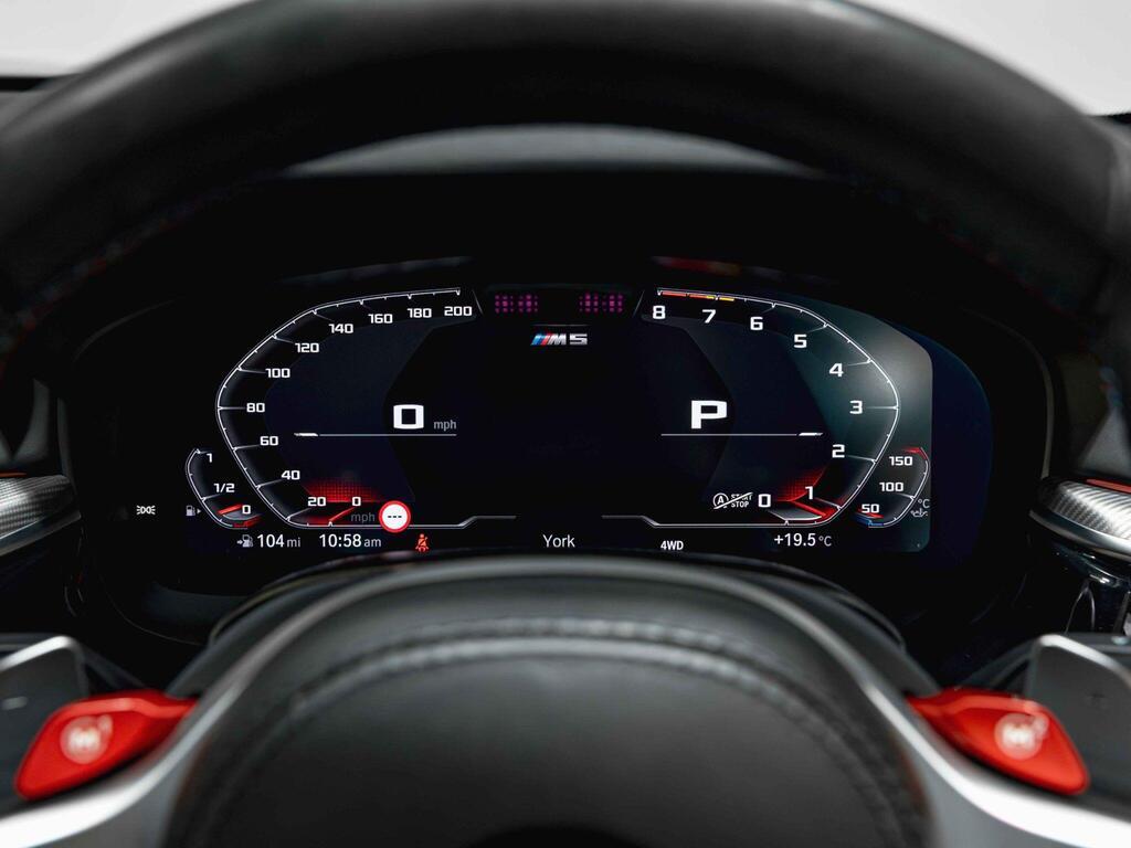 An interior shot of the driver instruments on a 2021 BMW M5