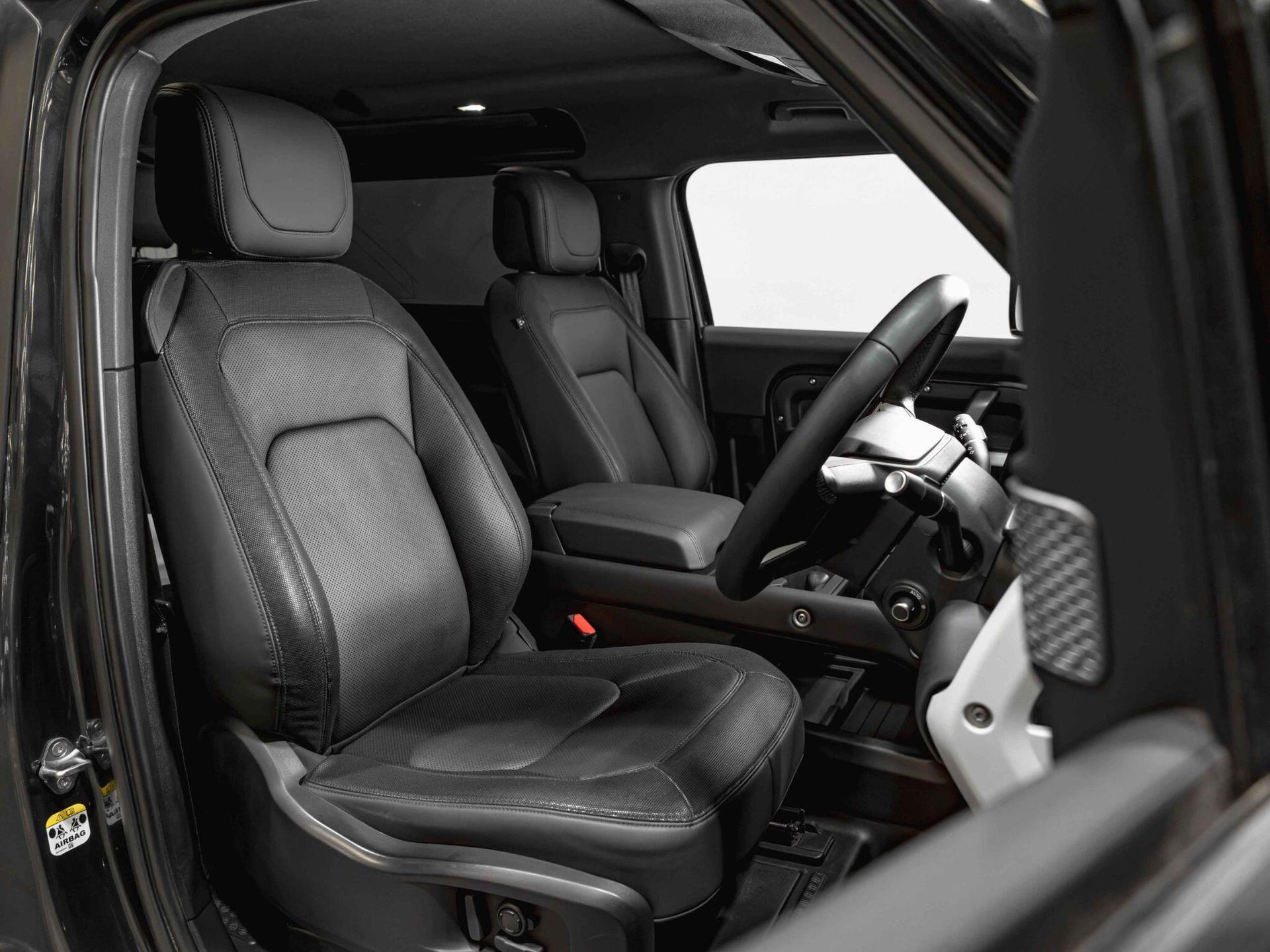 An interior shot of the driver seat on a 2024 Land Rover Defender 90