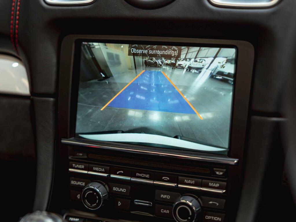 An interior shot of the infotainment system on a 2015 Porsche Boxster