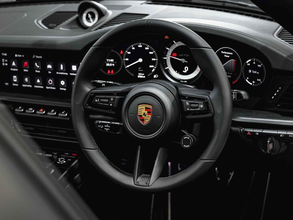 An interior shot of the steering wheel on a 2021 Porsche 911