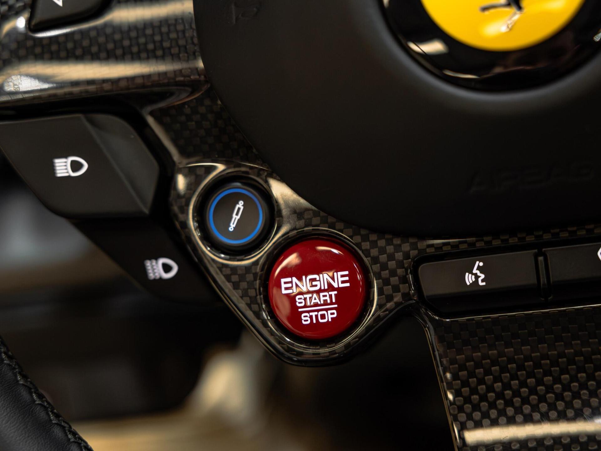 An interior shot of the misc controls on a 2021 Ferrari F8 Spider