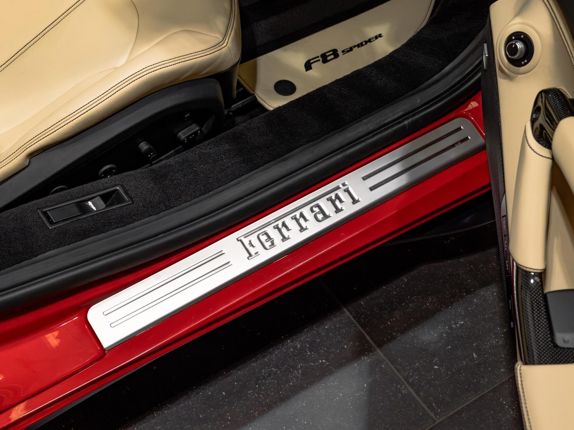 An exterior shot of the badge exterior on a 2021 Ferrari F8 Spider
