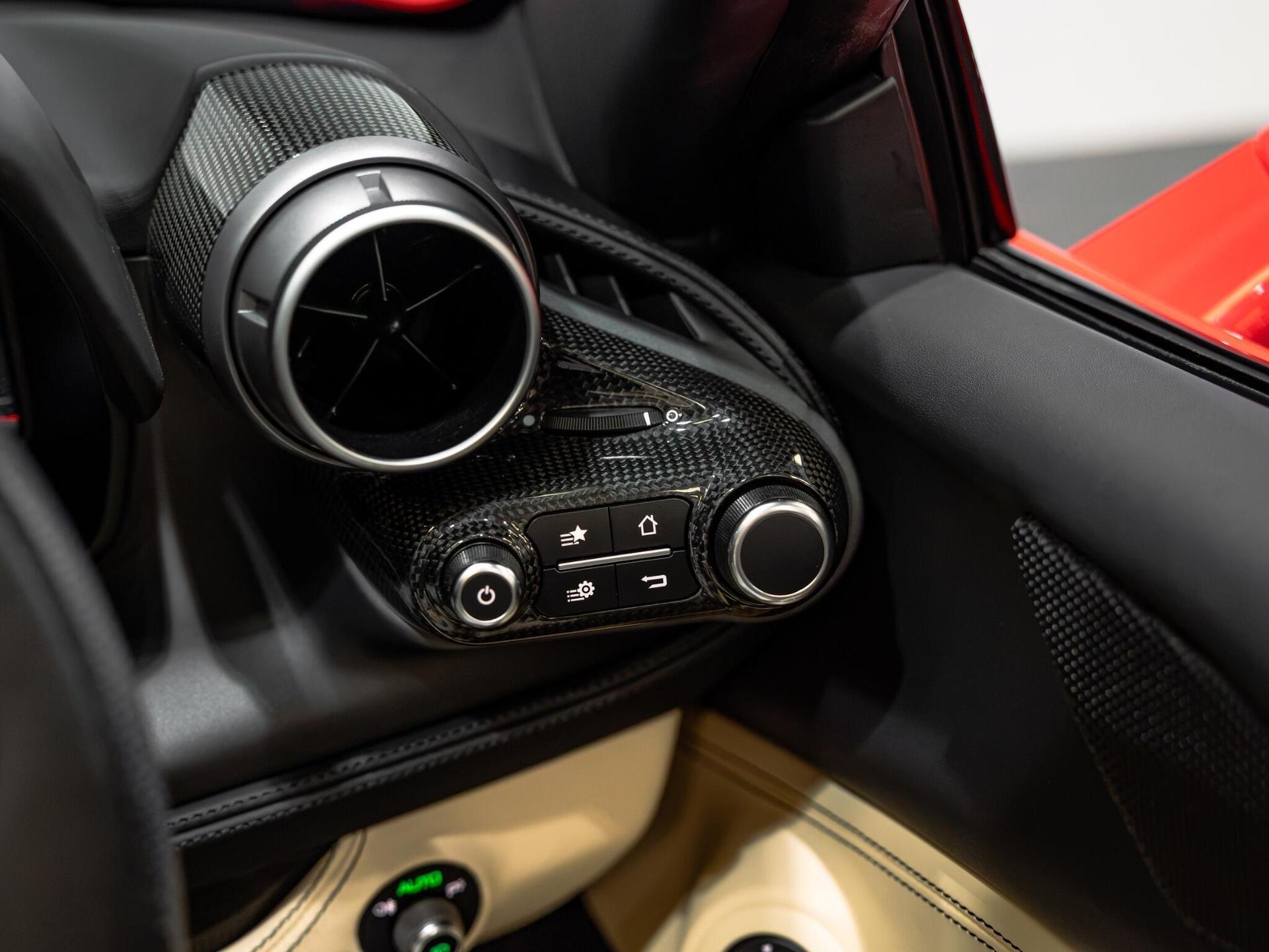 An interior shot of the misc controls on a 2021 Ferrari F8 Spider