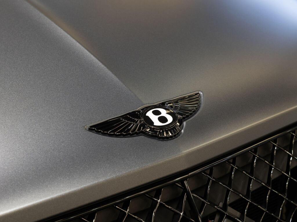 An exterior shot of the badge exterior on a 2025 Bentley Bentayga