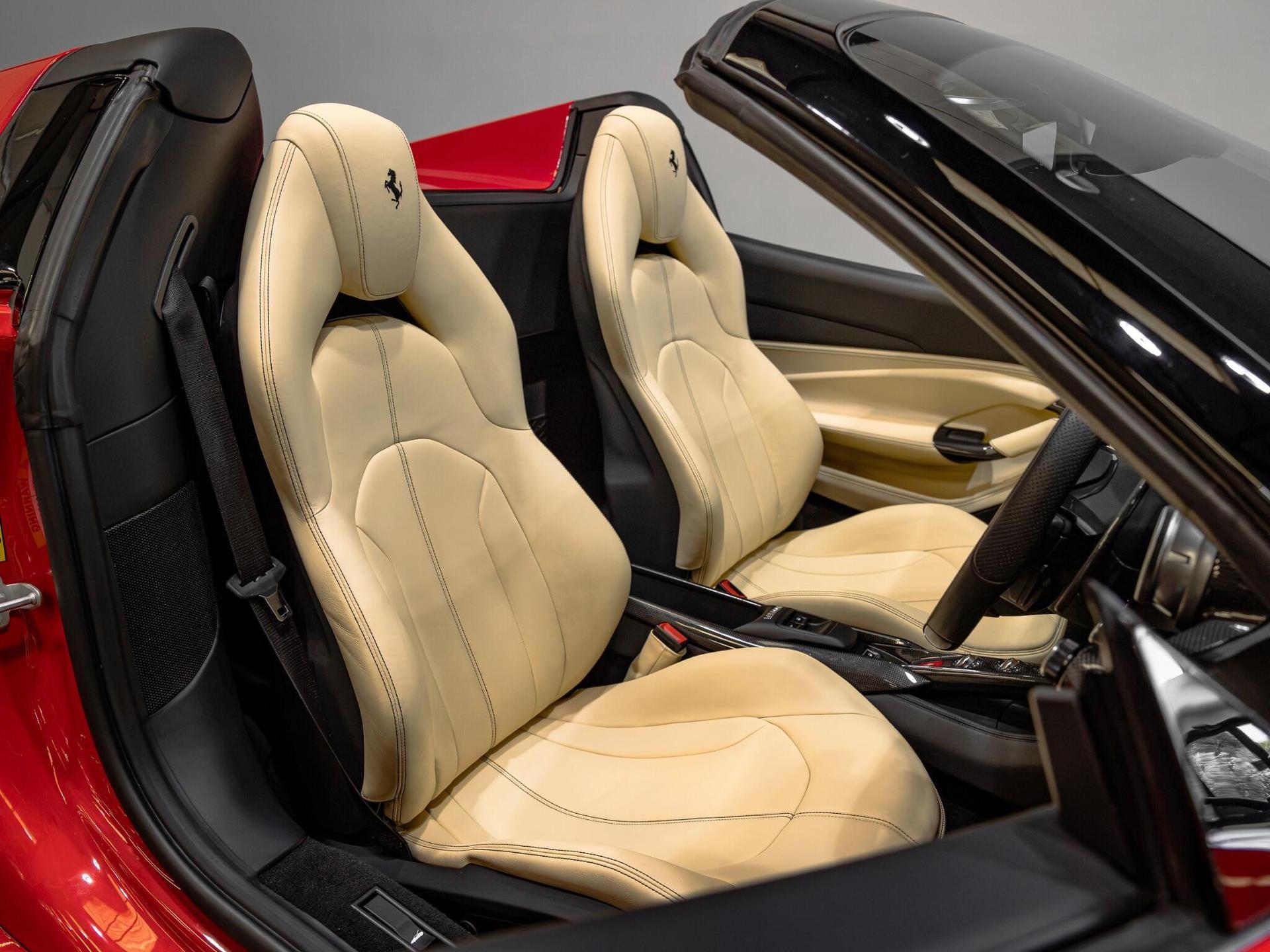 An interior shot of the driver seat on a 2021 Ferrari F8 Spider