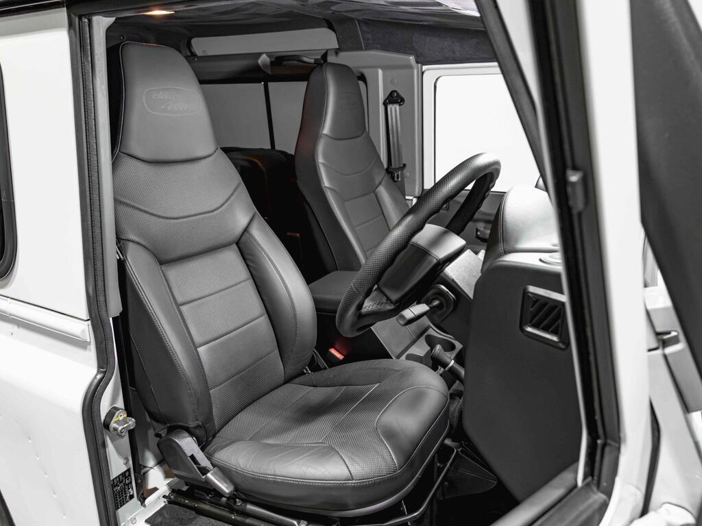 An interior shot of the driver seat on a 2016 Land Rover Defender 90