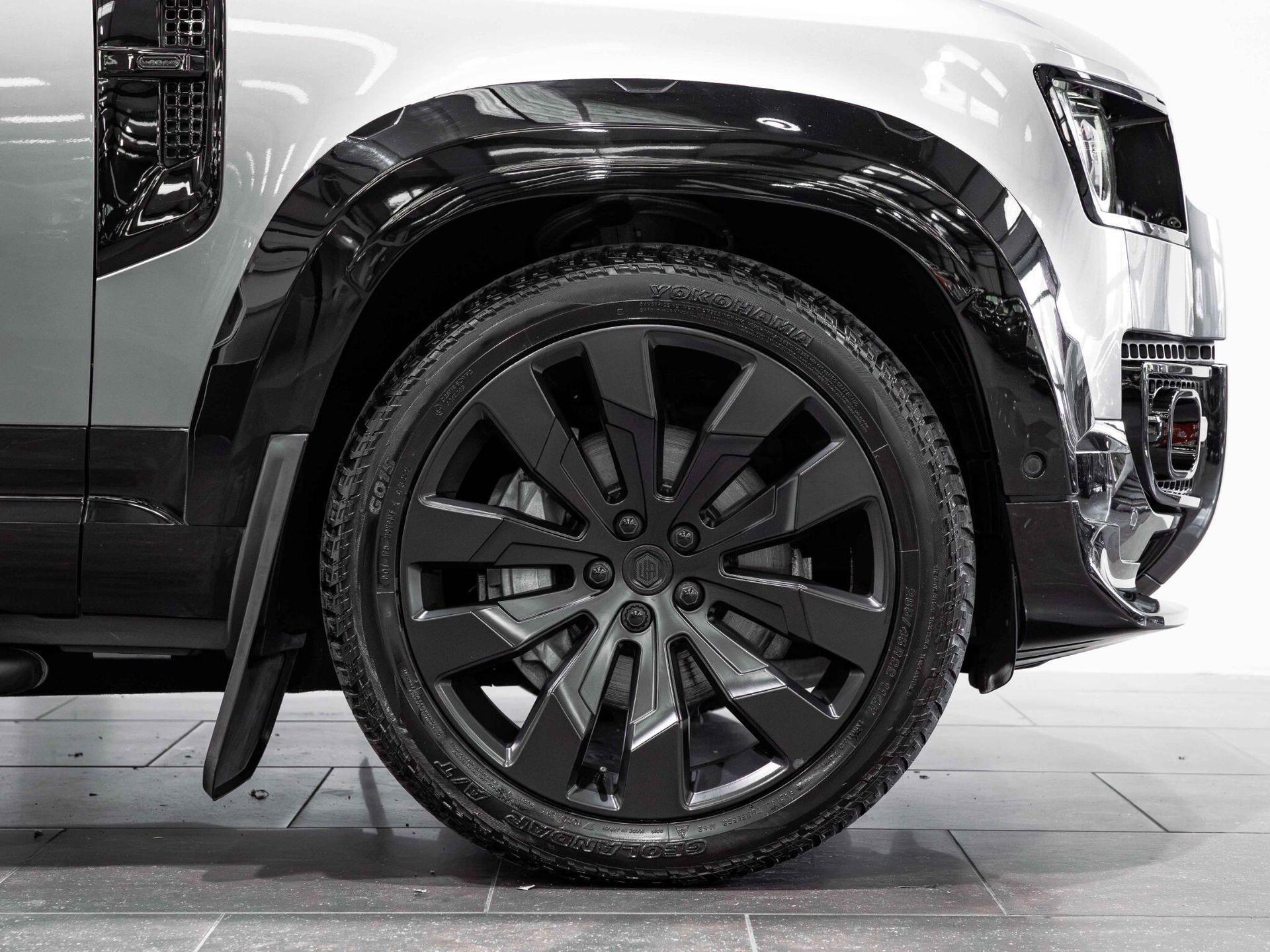 An exterior shot of the wheel on a 2023 Land Rover Defender 110