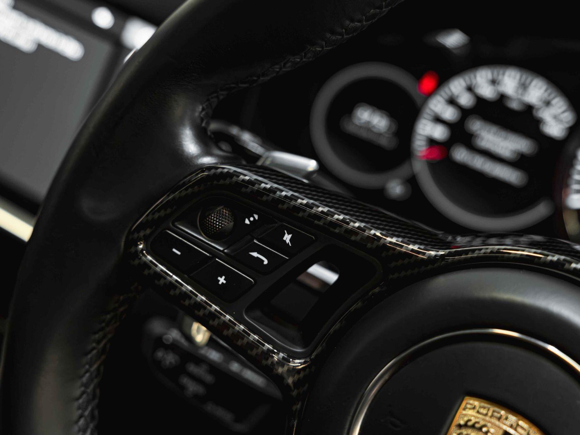 An interior shot of the misc controls on a 2019 Porsche Cayenne