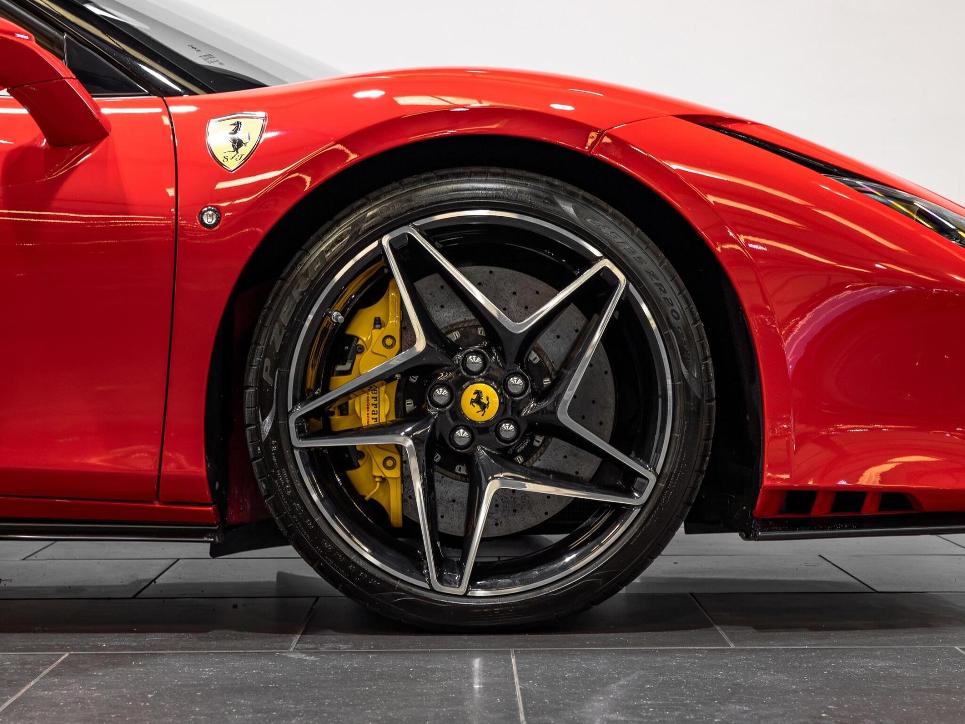 An exterior shot of the wheel on a 2021 Ferrari F8 Spider