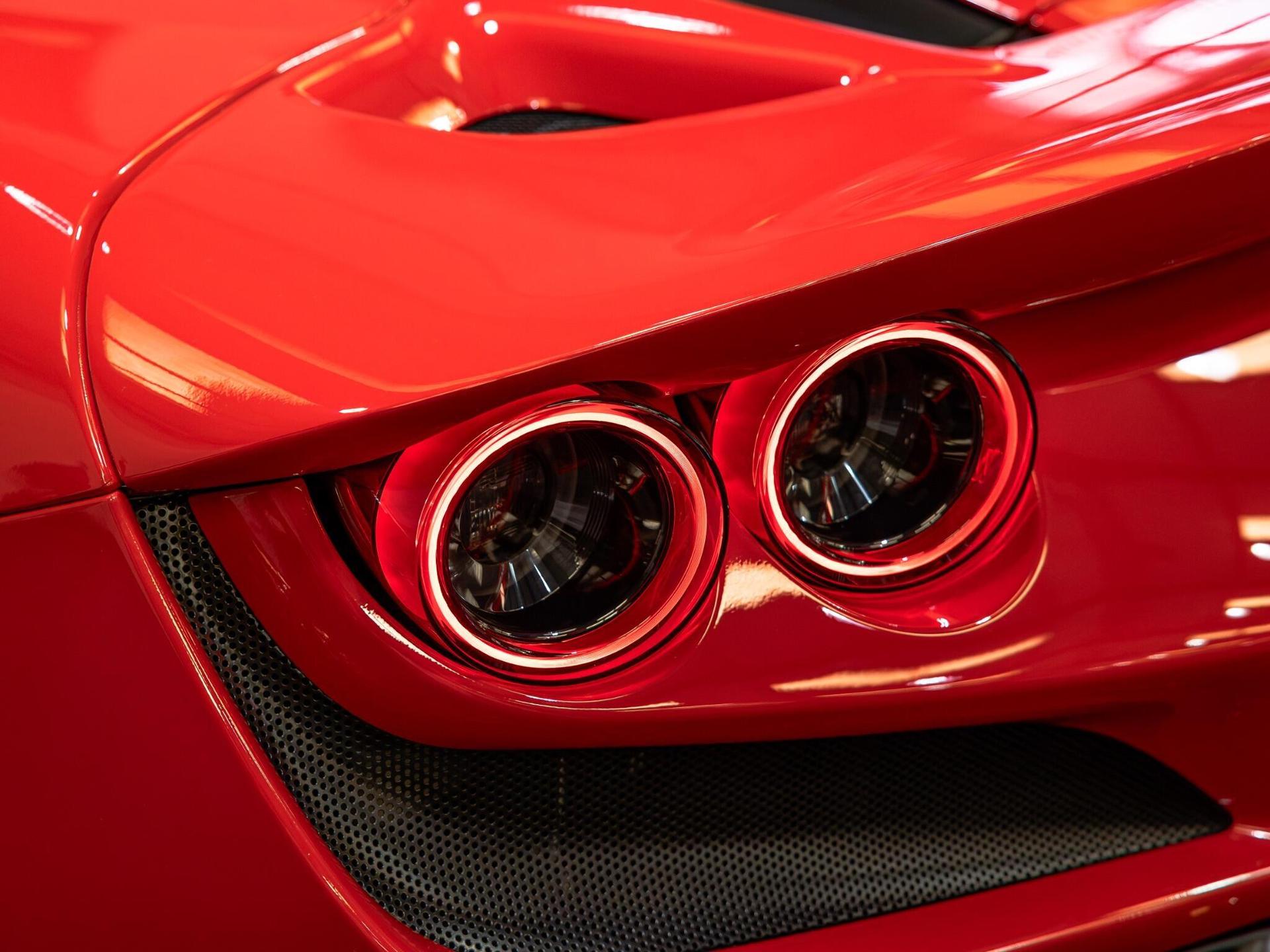 An exterior shot of the lights front on a 2021 Ferrari F8 Spider