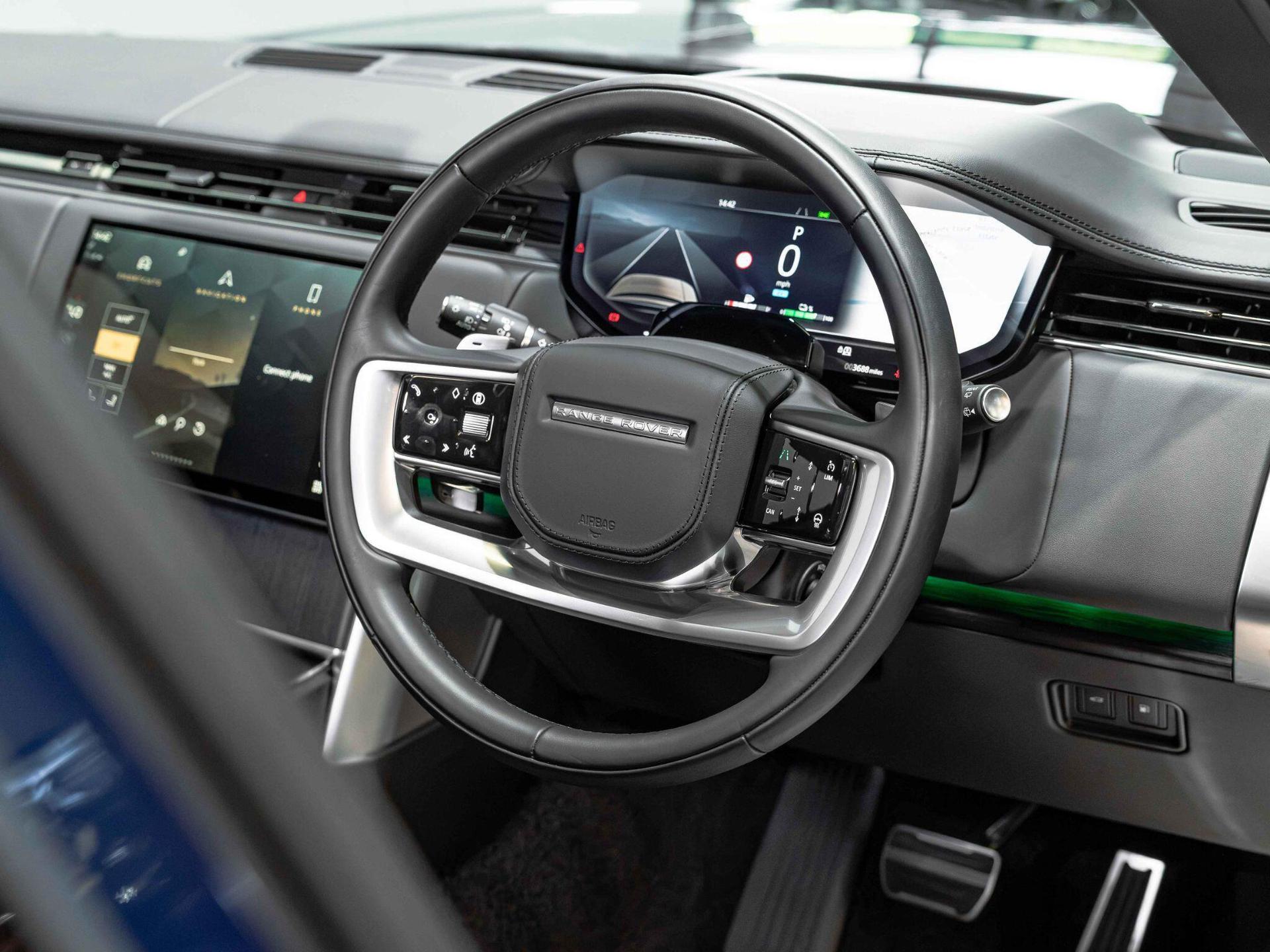 An interior shot of the steering wheel on a 2026 Land Rover Range Rover