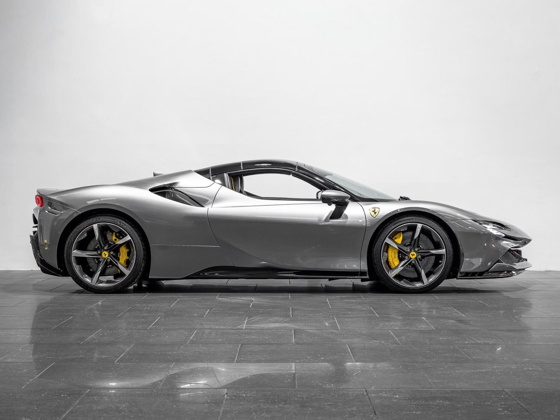 An exterior shot of the side right on a 2023 Ferrari SF90 Spider
