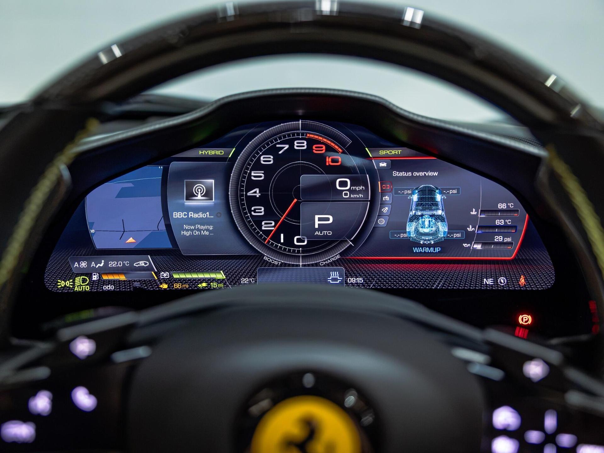 An interior shot of the driver instruments on a 2023 Ferrari SF90 Spider