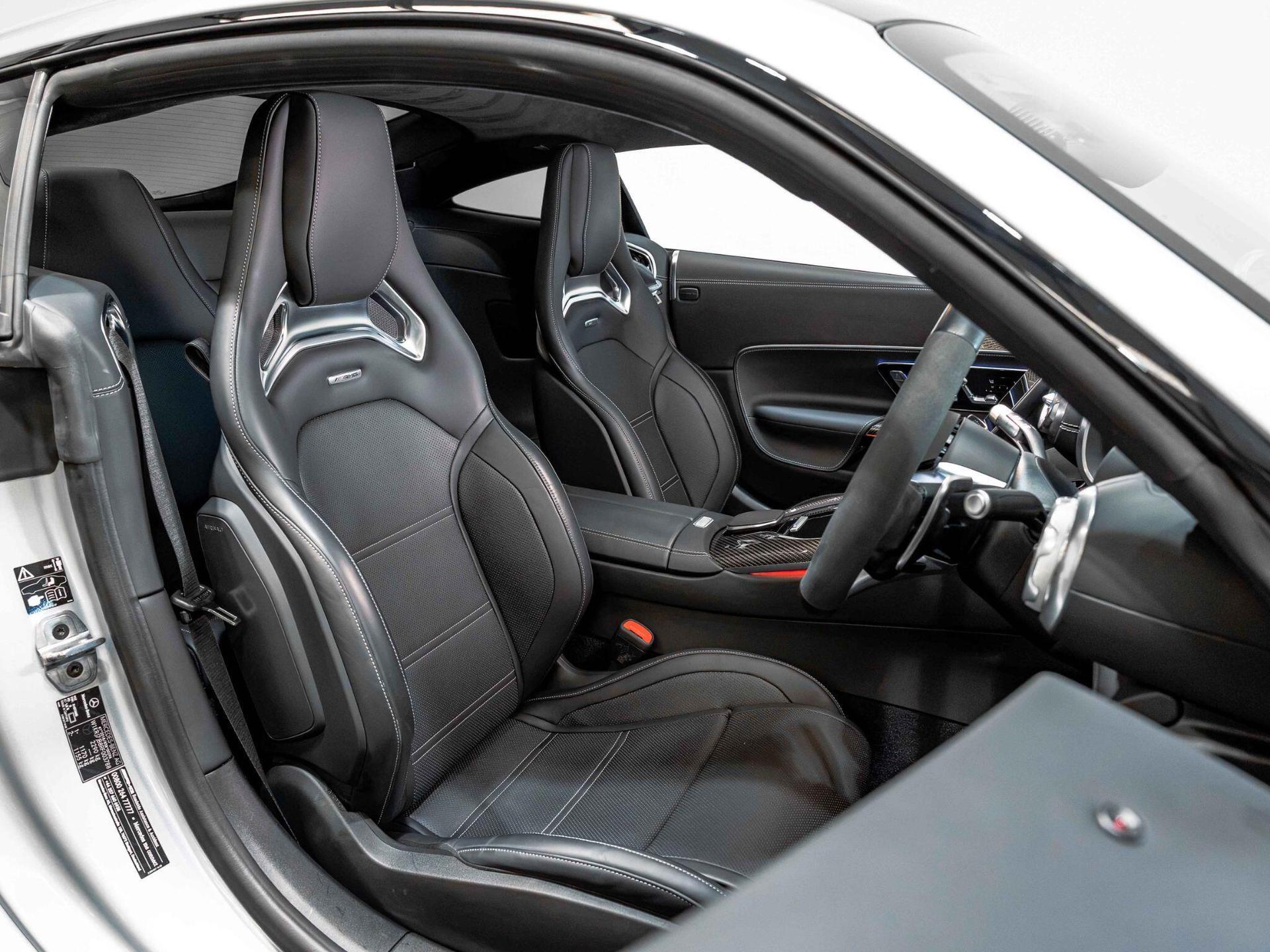 An interior shot of the driver seat on a 2024 Mercedes-Benz AMG GT