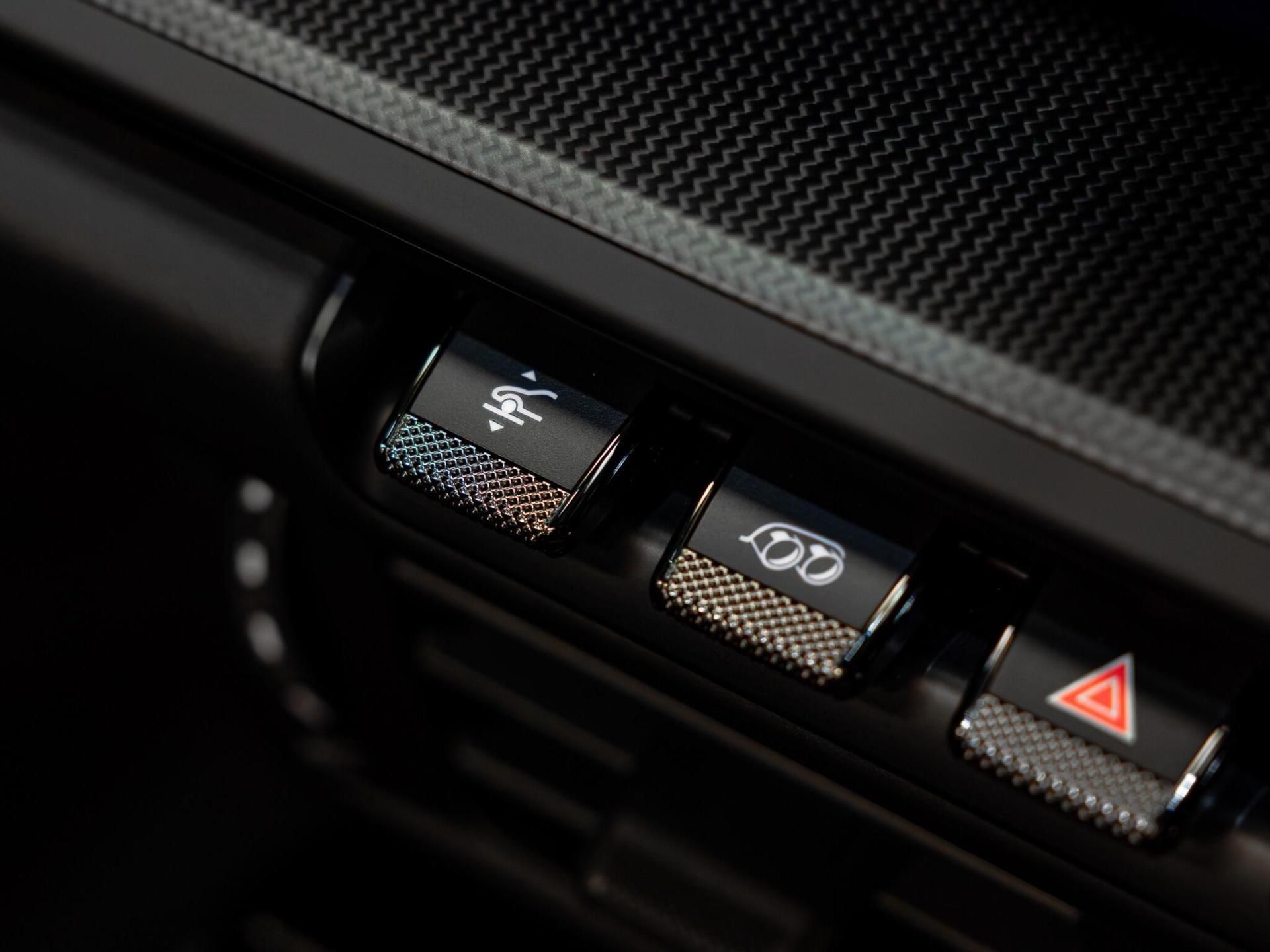 An interior shot of the misc controls on a 2026 Porsche 911