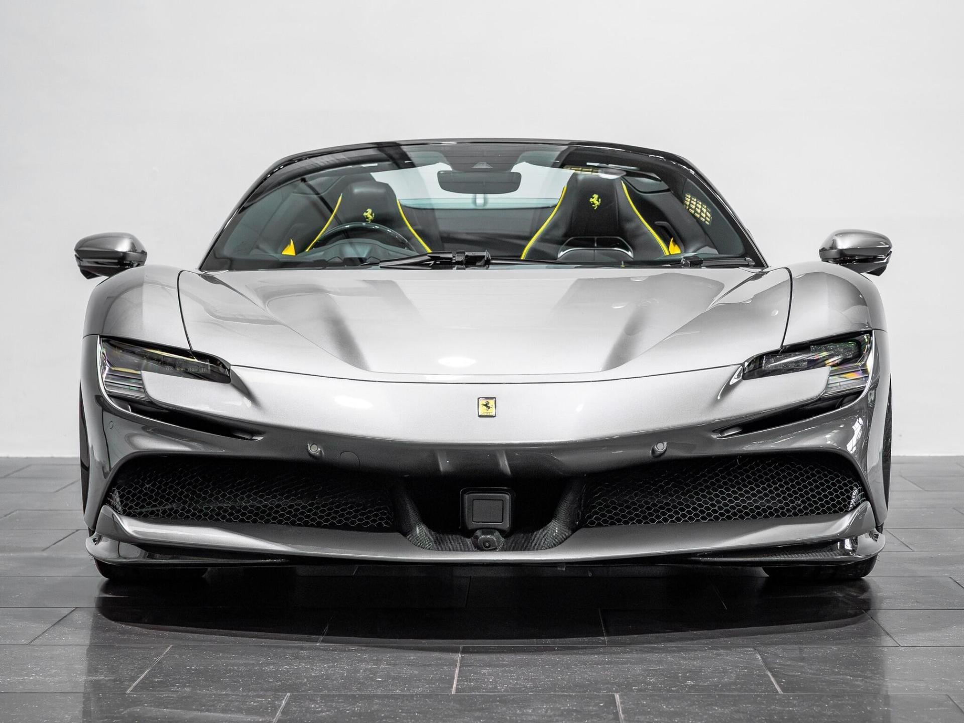 An exterior shot of the front on a 2023 Ferrari SF90 Spider