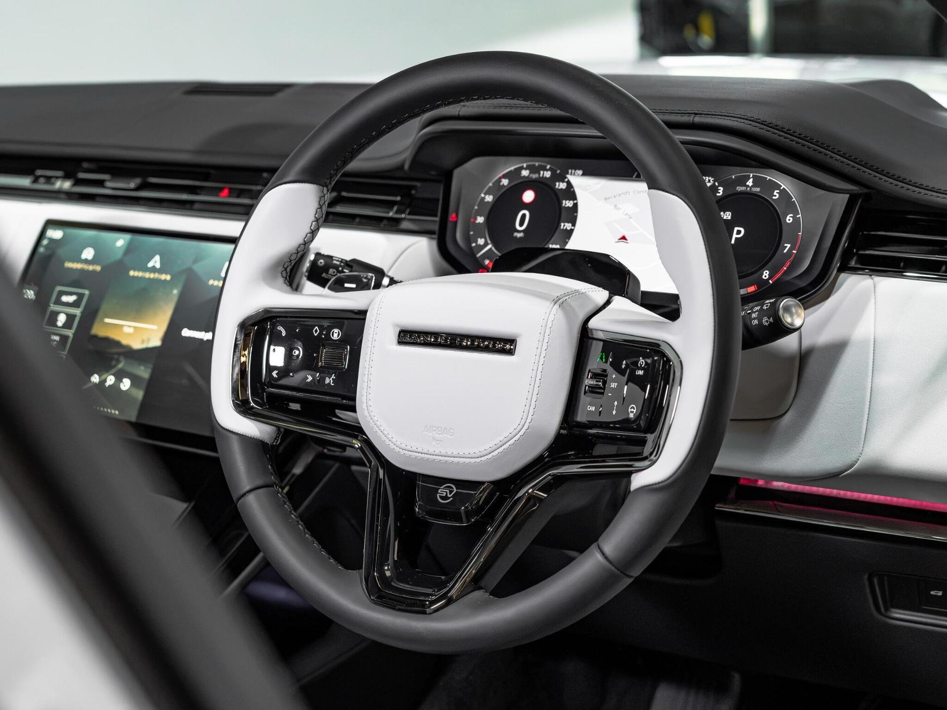 An interior shot of the steering wheel on a 2026 Land Rover Range Rover Sport