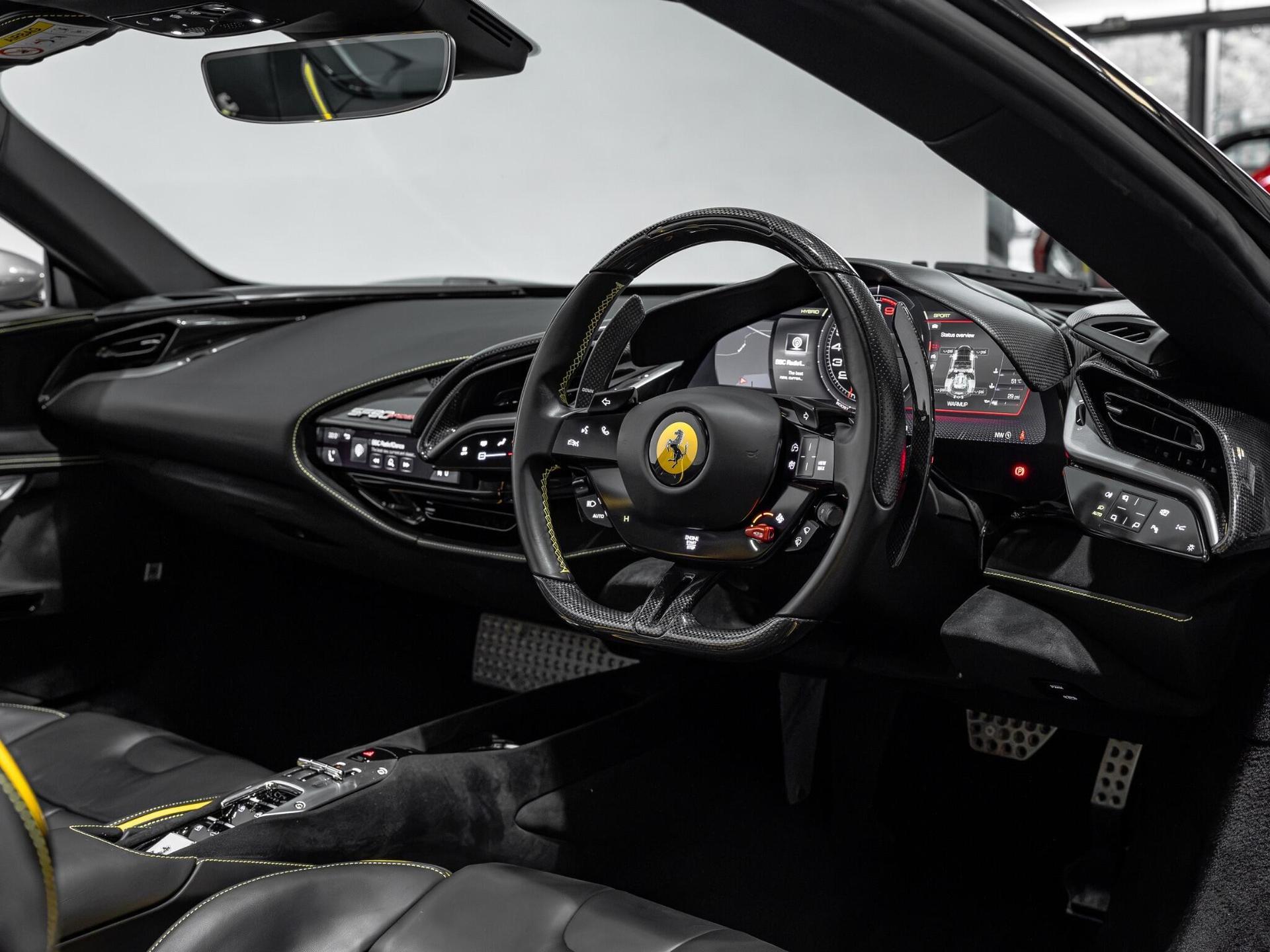An interior shot of the interior front on a 2023 Ferrari SF90 Spider