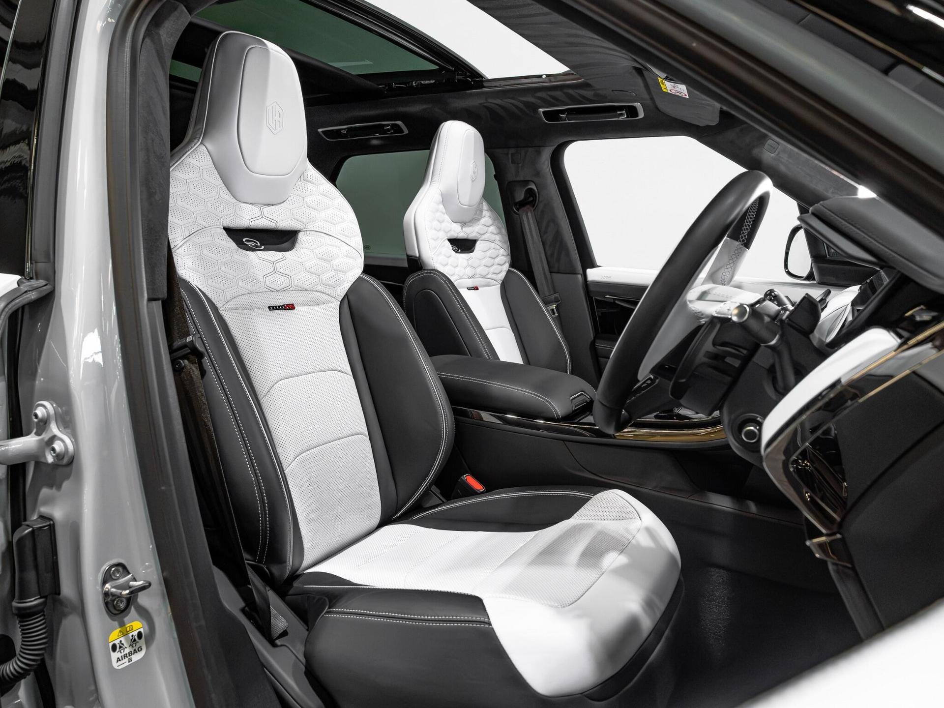 An interior shot of the driver seat on a 2026 Land Rover Range Rover Sport