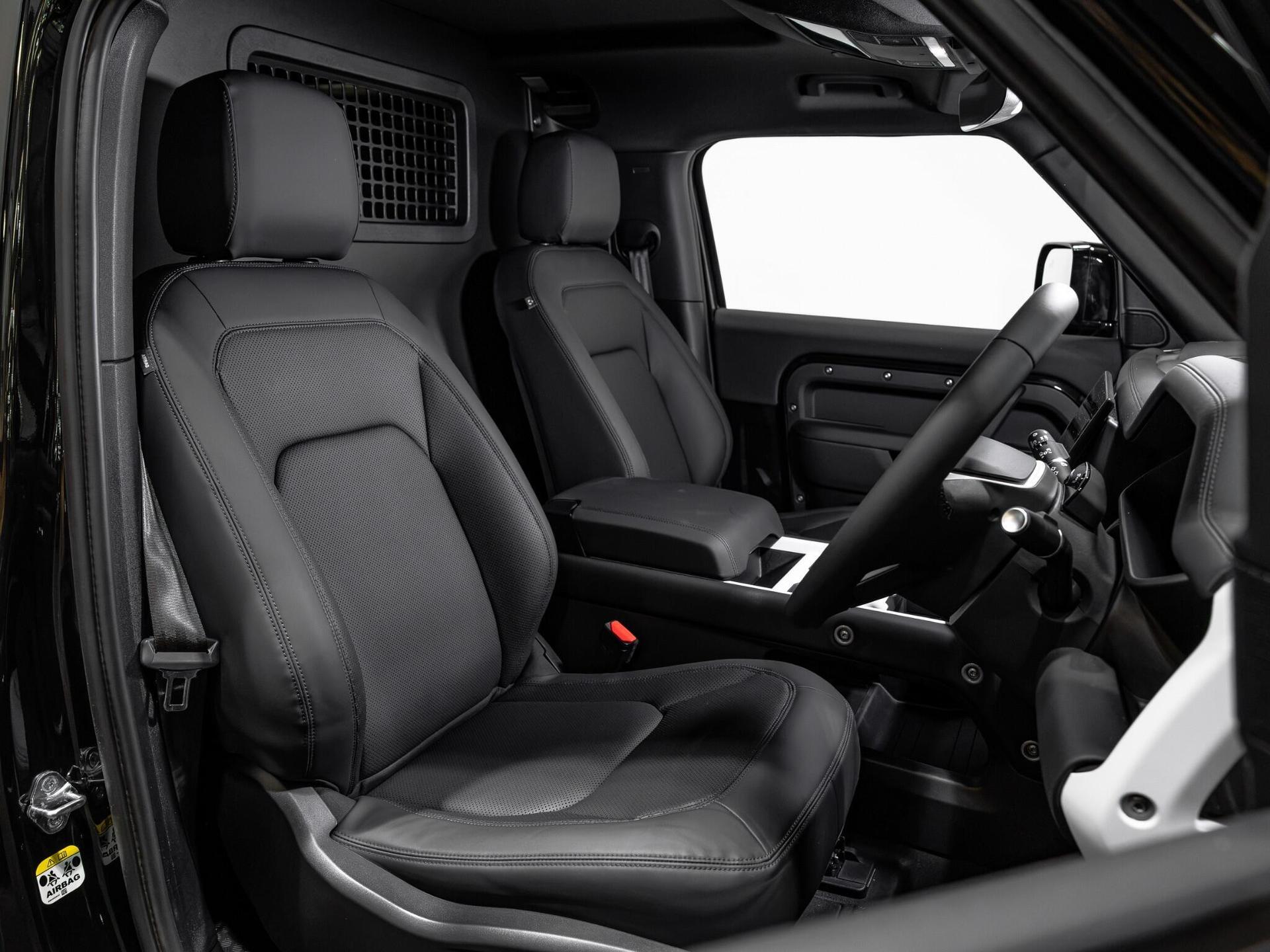 An interior shot of the driver seat on a 2026 Land Rover Defender 90