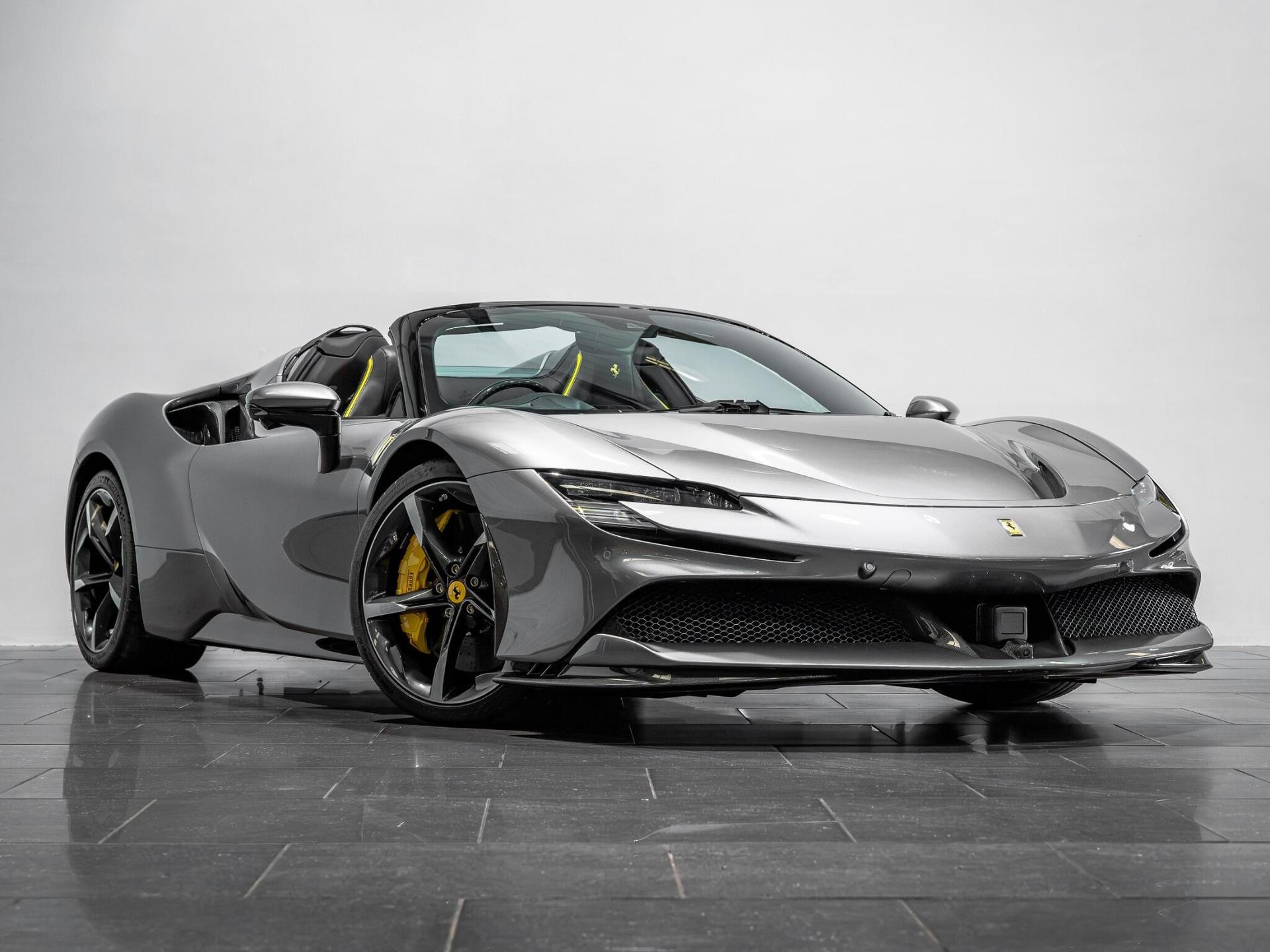 An exterior shot of the front right on a 2023 Ferrari SF90 Spider