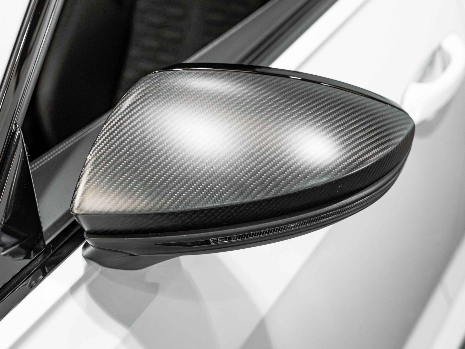 An exterior shot of the wing mirror on a 2024 Audi RS6 Avant