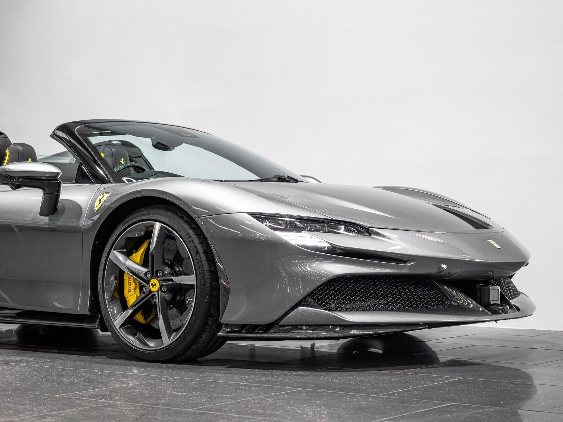 An exterior shot of the front right on a 2023 Ferrari SF90 Spider
