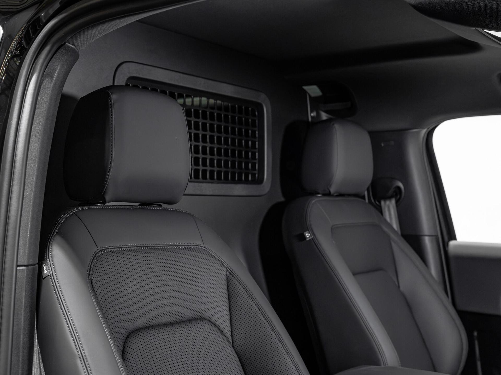 An interior shot of the seat front passenger on a 2026 Land Rover Defender 90
