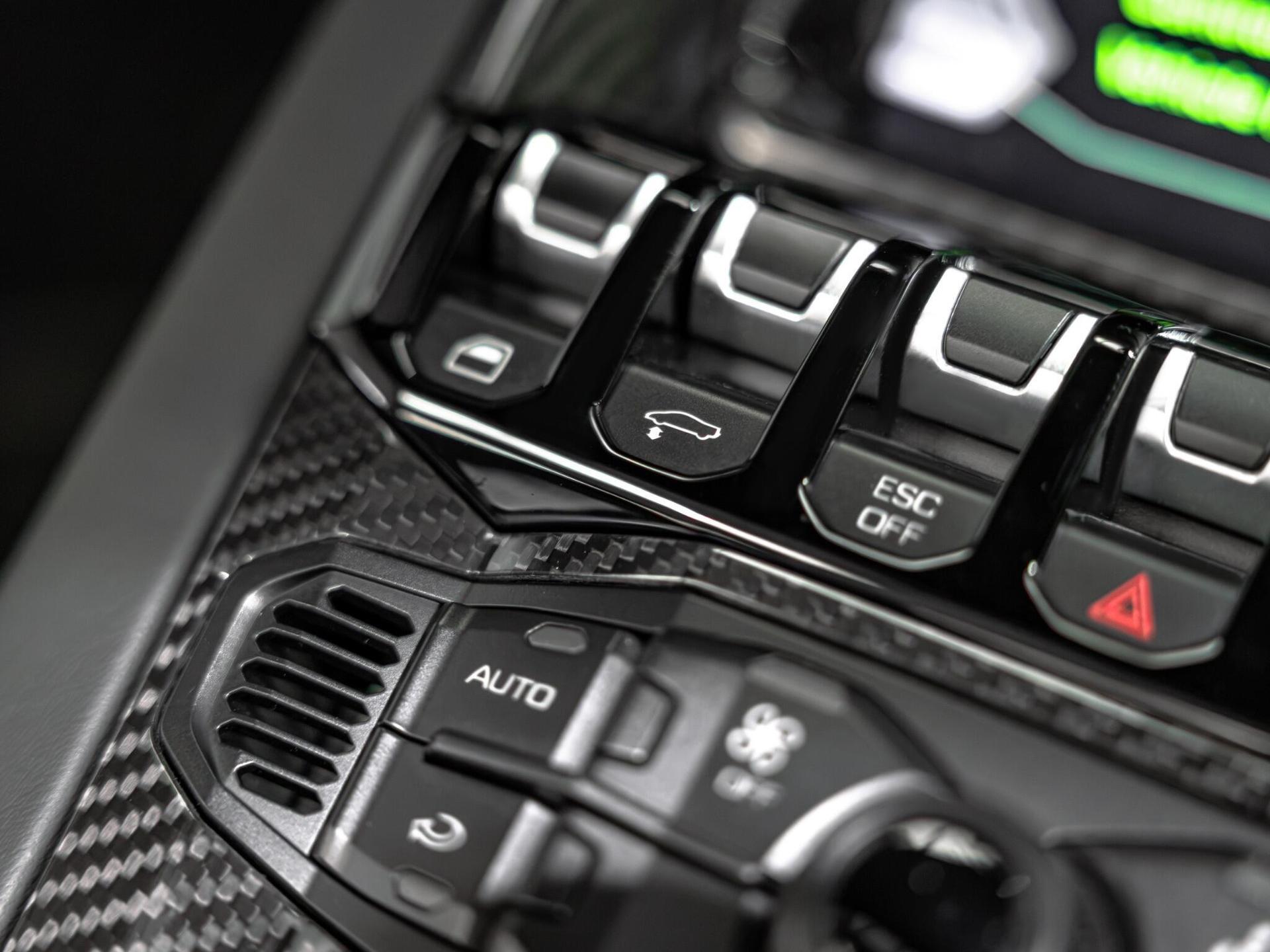 An interior shot of the misc controls on a 2017 Lamborghini Aventador