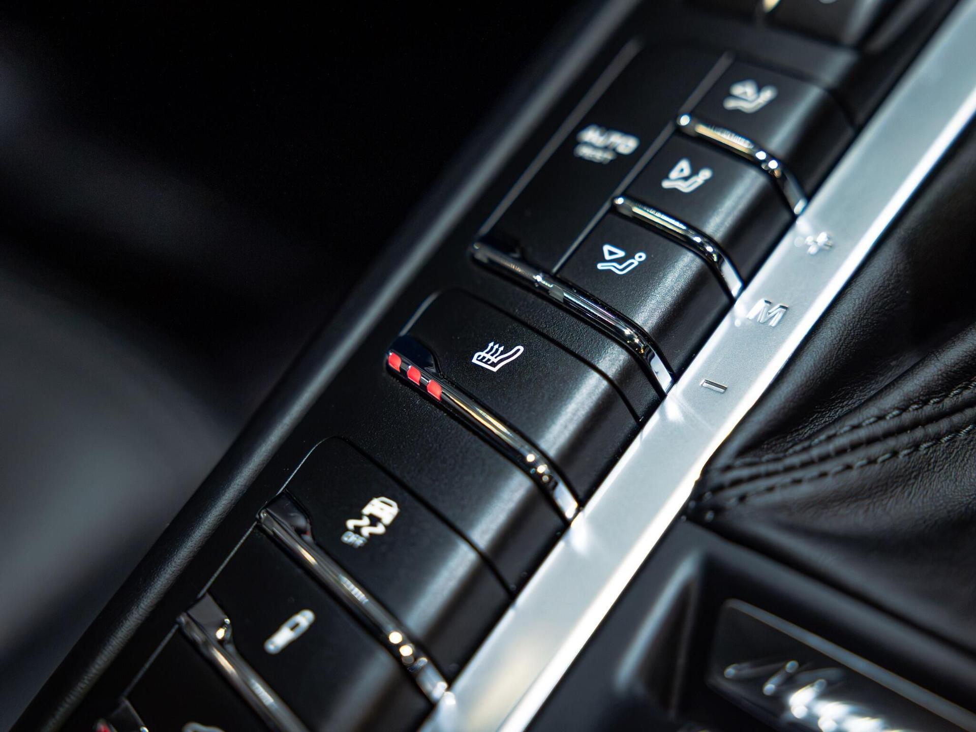 An interior shot of the misc controls on a 2020 Porsche Macan