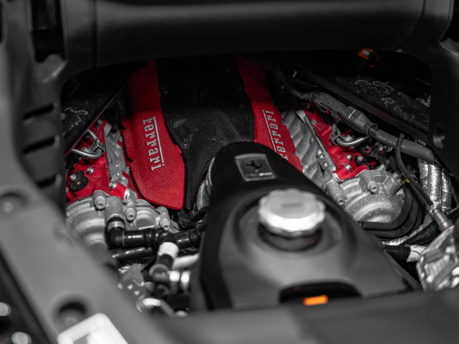 An exterior shot of the engine on a 2023 Ferrari SF90 Spider