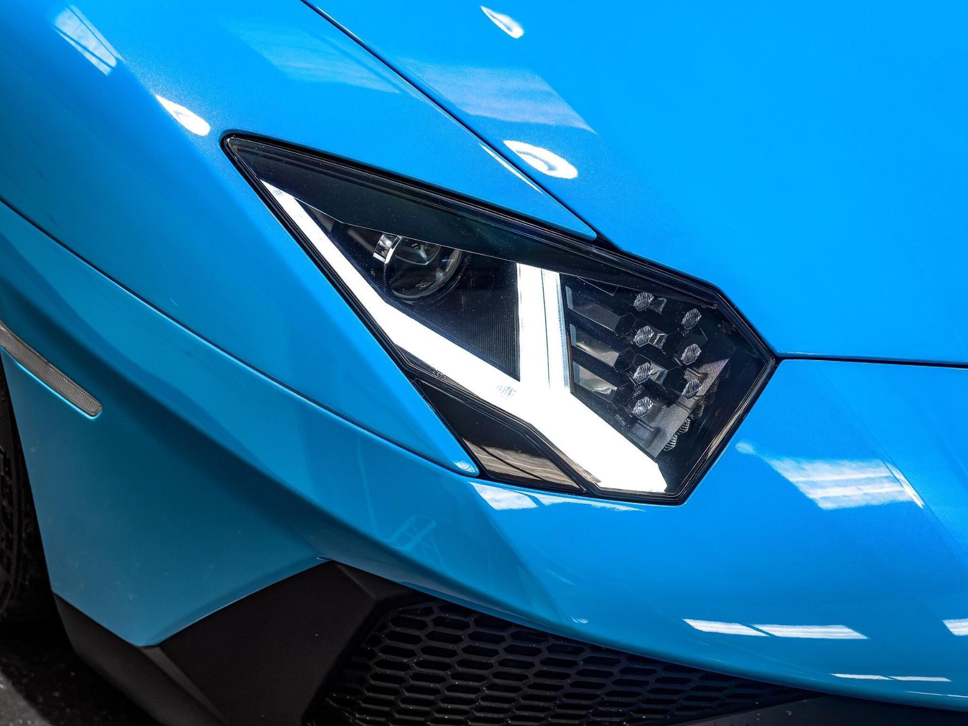 An exterior shot of the lights front on a 2017 Lamborghini Aventador