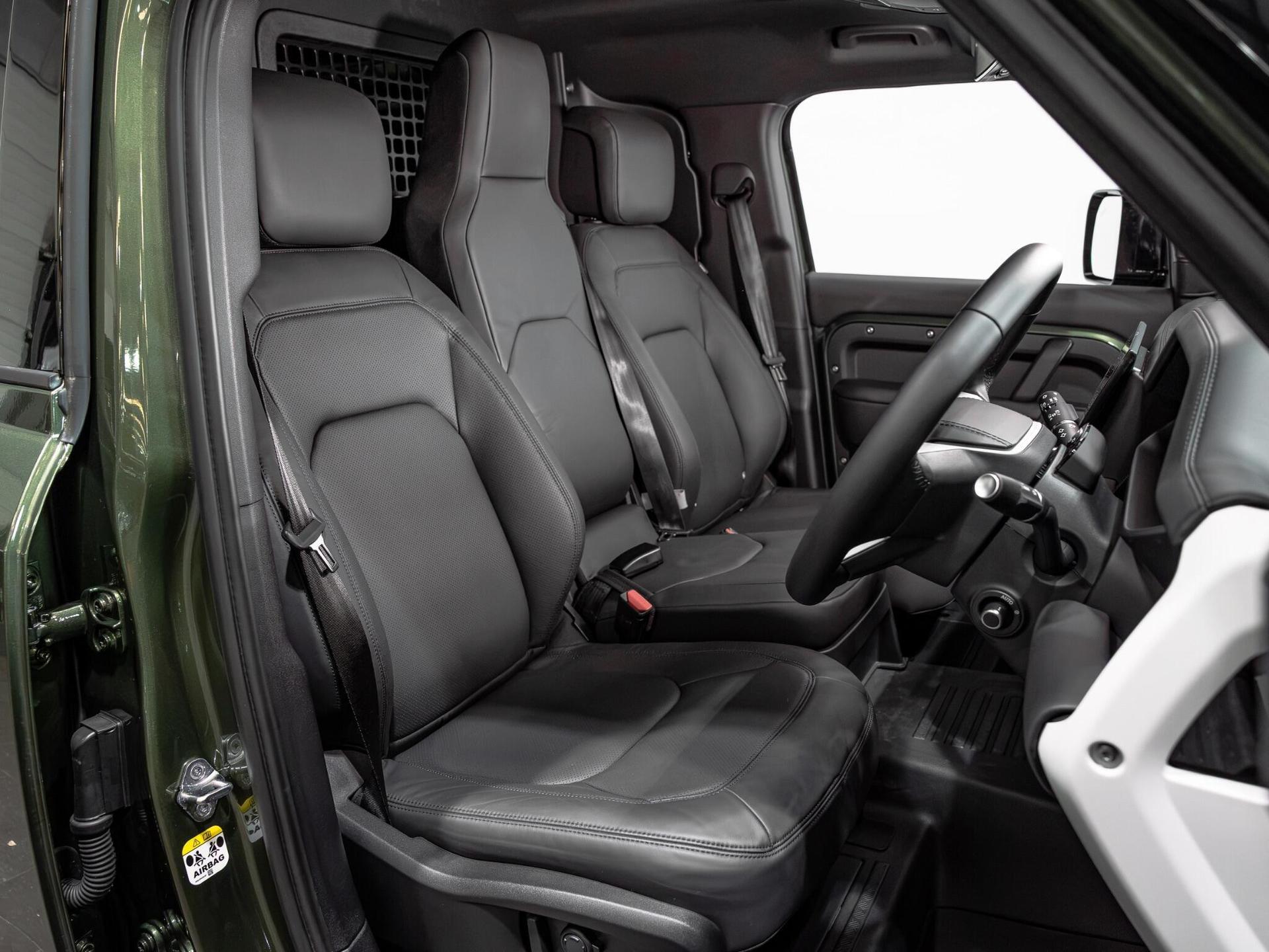 An interior shot of the driver seat on a 2026 Land Rover Defender 110