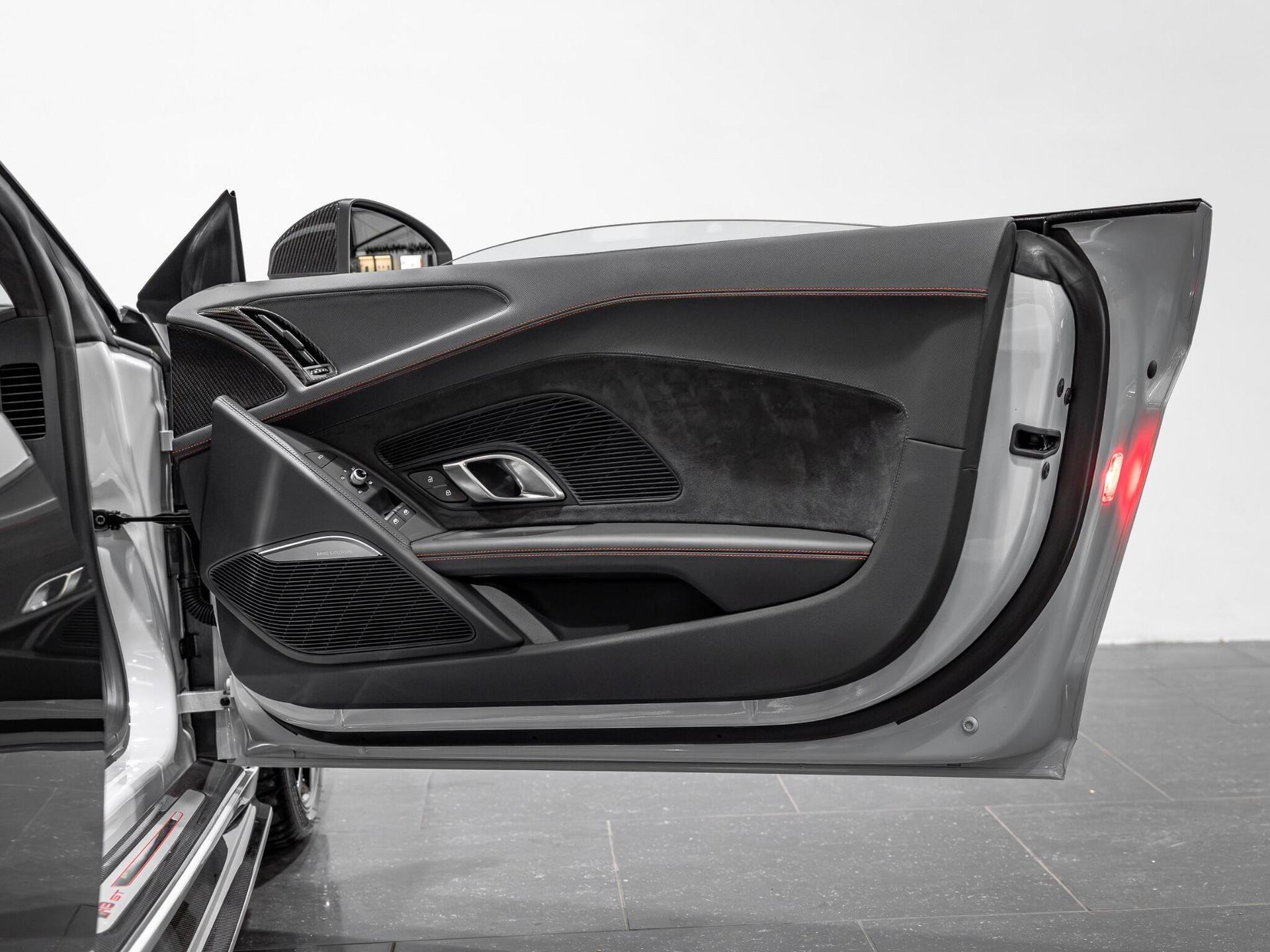 An interior shot of the door interior on a 2023 Audi R8