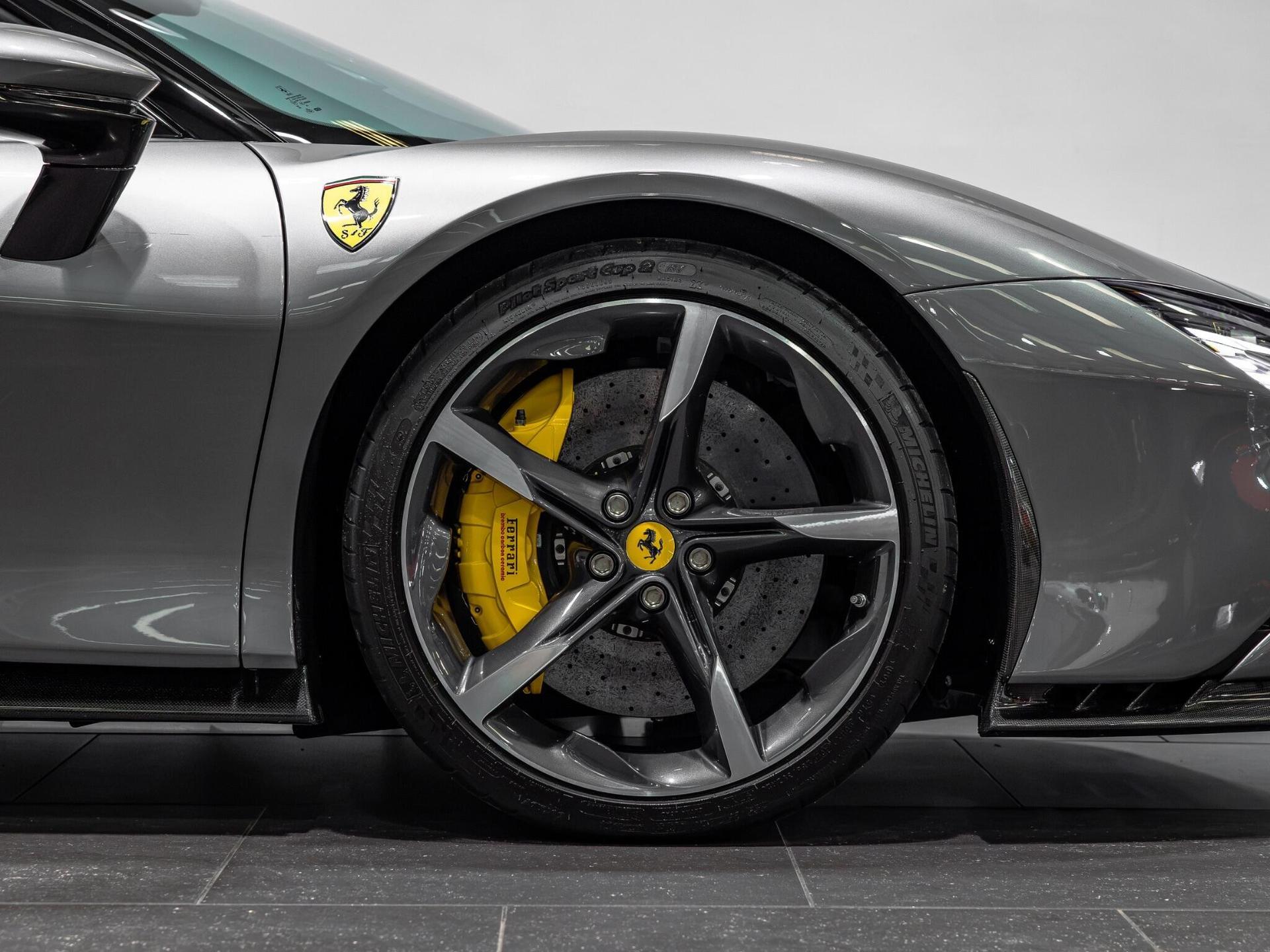 An exterior shot of the wheel on a 2023 Ferrari SF90 Spider