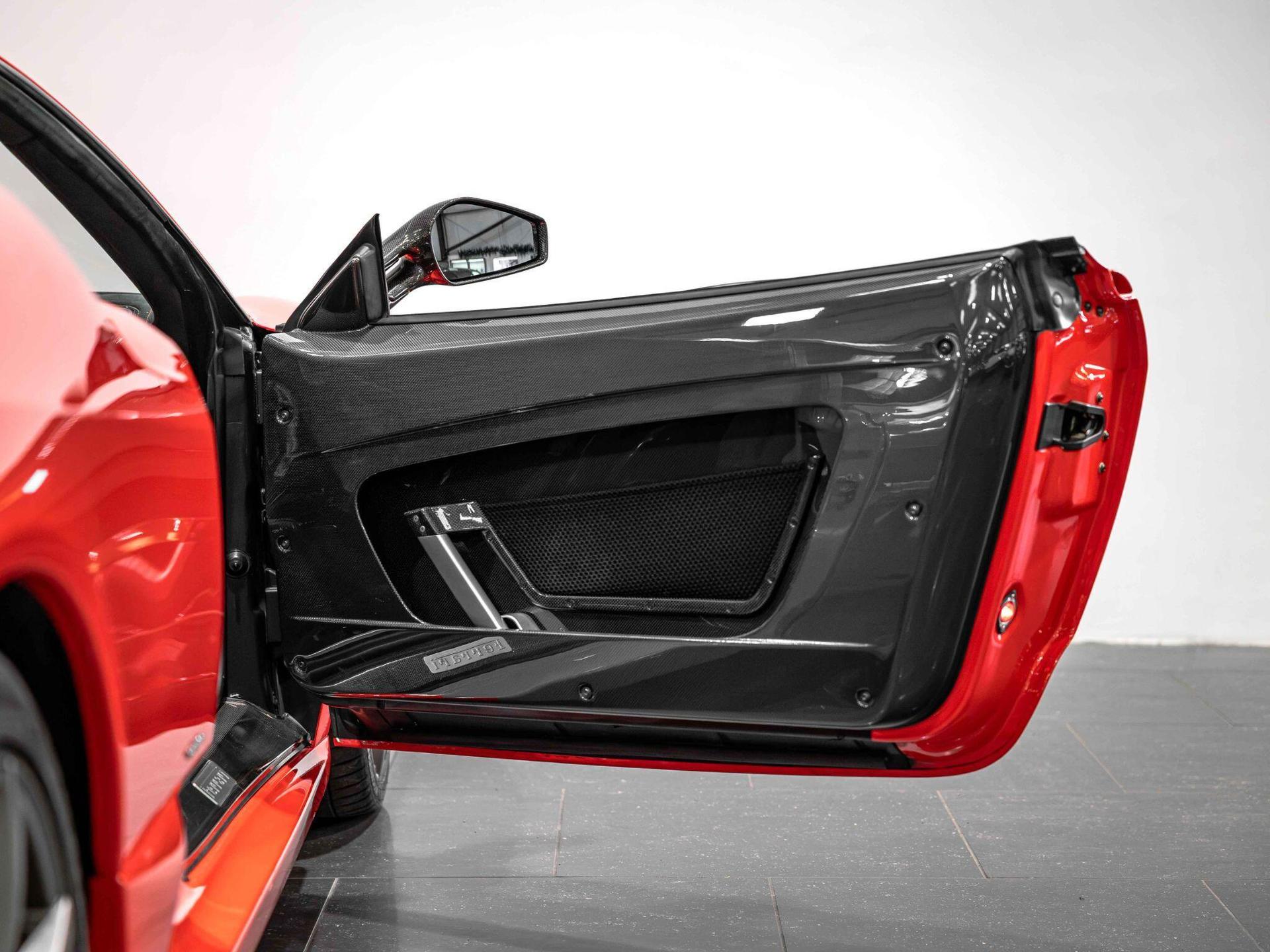 An interior shot of the door interior on a 2008 Ferrari 430