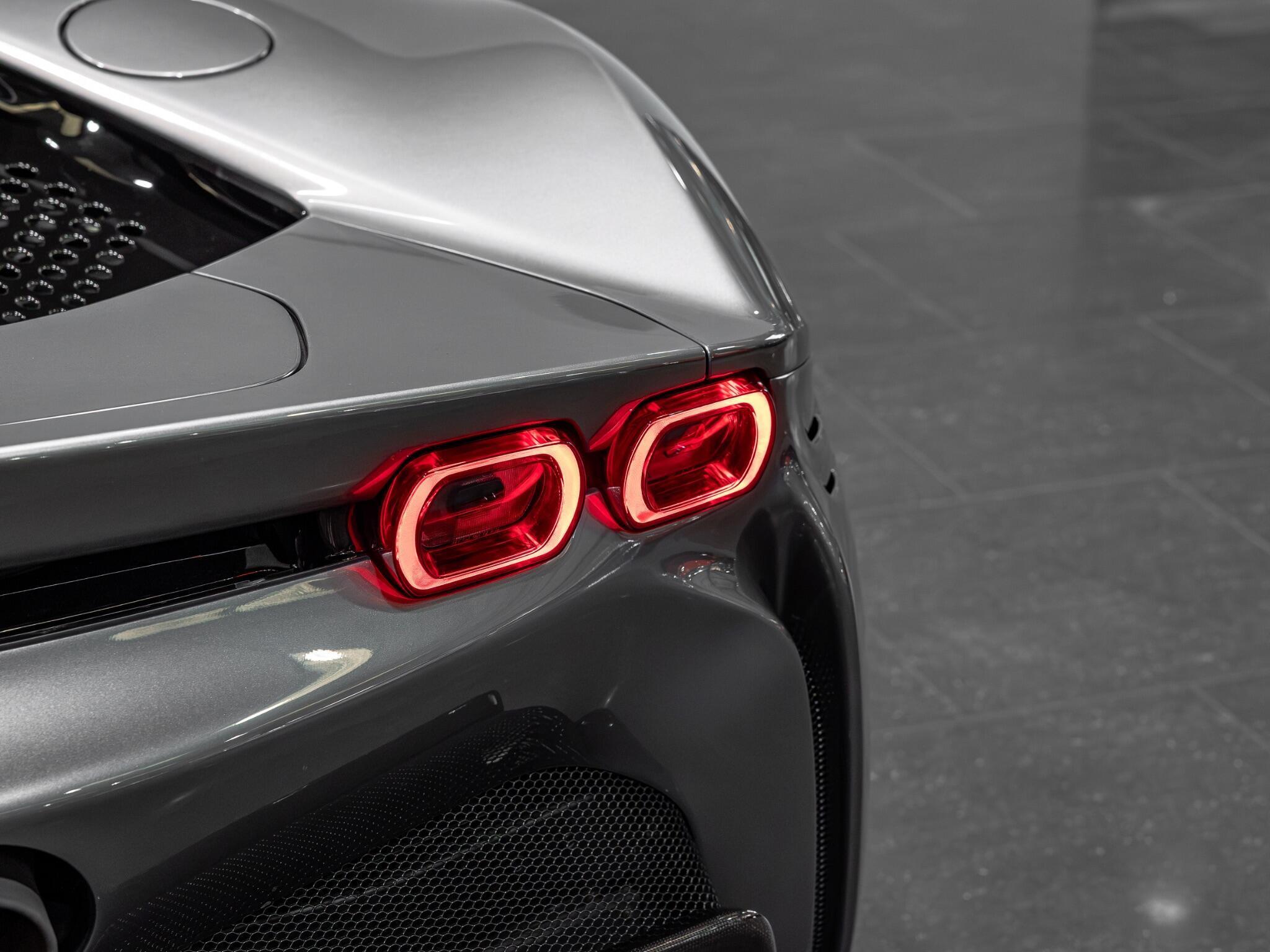 An exterior shot of the lights rear on a 2023 Ferrari SF90 Spider